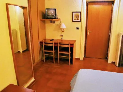 Seating area, Bed in Hotel Minerva