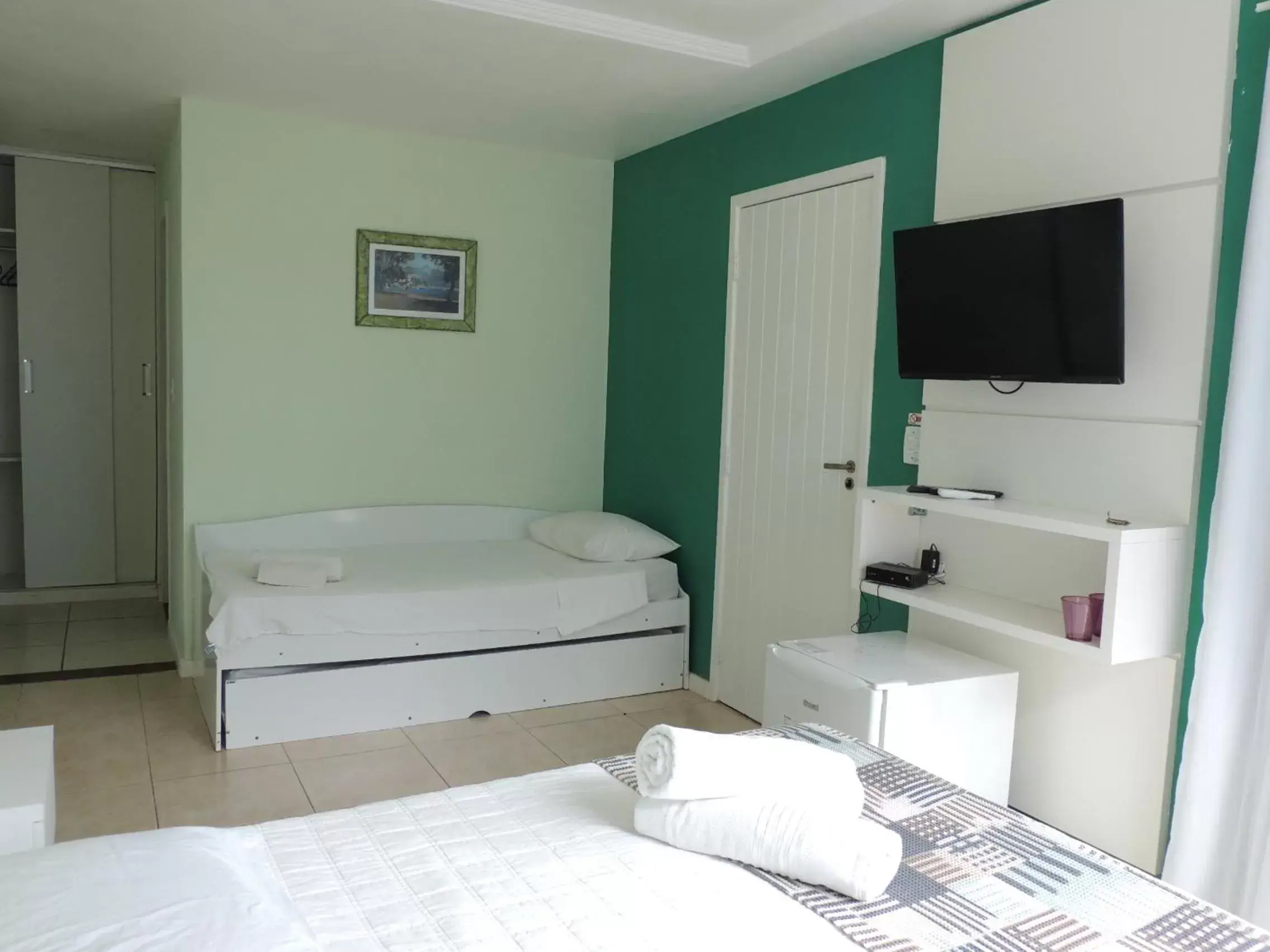 Standard Triple Room in Pousada Akaroa Standard Triple Room in Pousada Akaroa