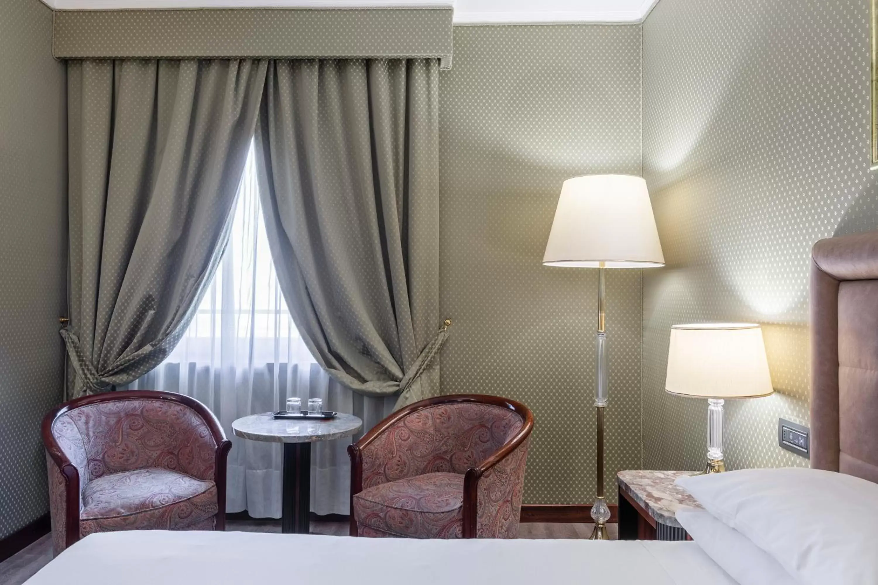 Bedroom, Seating Area in Doria Grand Hotel