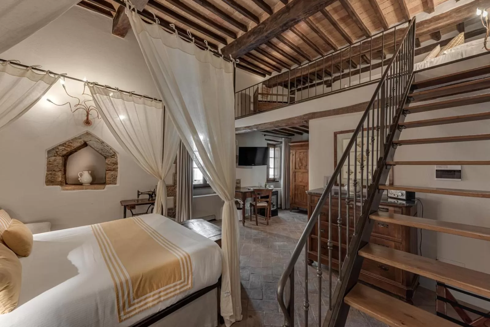 Photo of the whole room, Bed in PALAZZO DEL CAPITANO Wellness & Relais - Luxury Borgo Capitano Collection