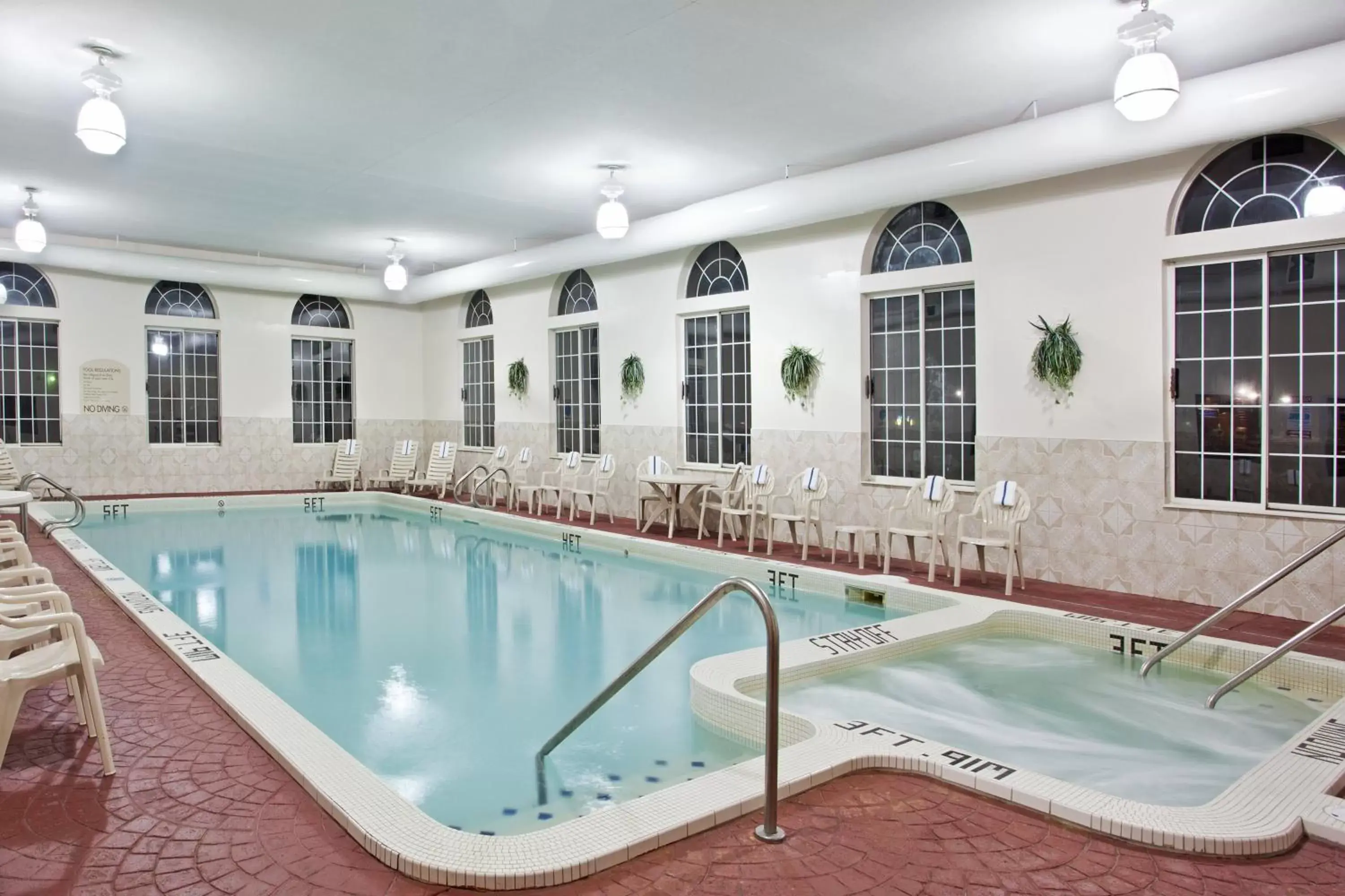 Swimming Pool in Holiday Inn Express Birch Run-Frankenmuth Area, an IHG Hotel