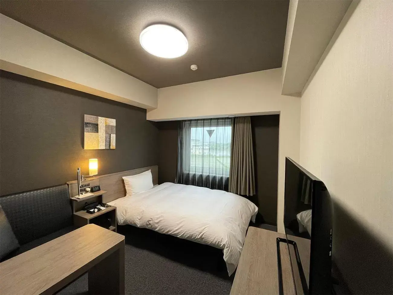 Photo of the whole room, Bed in Hotel Route-Inn Saku Minami Inter