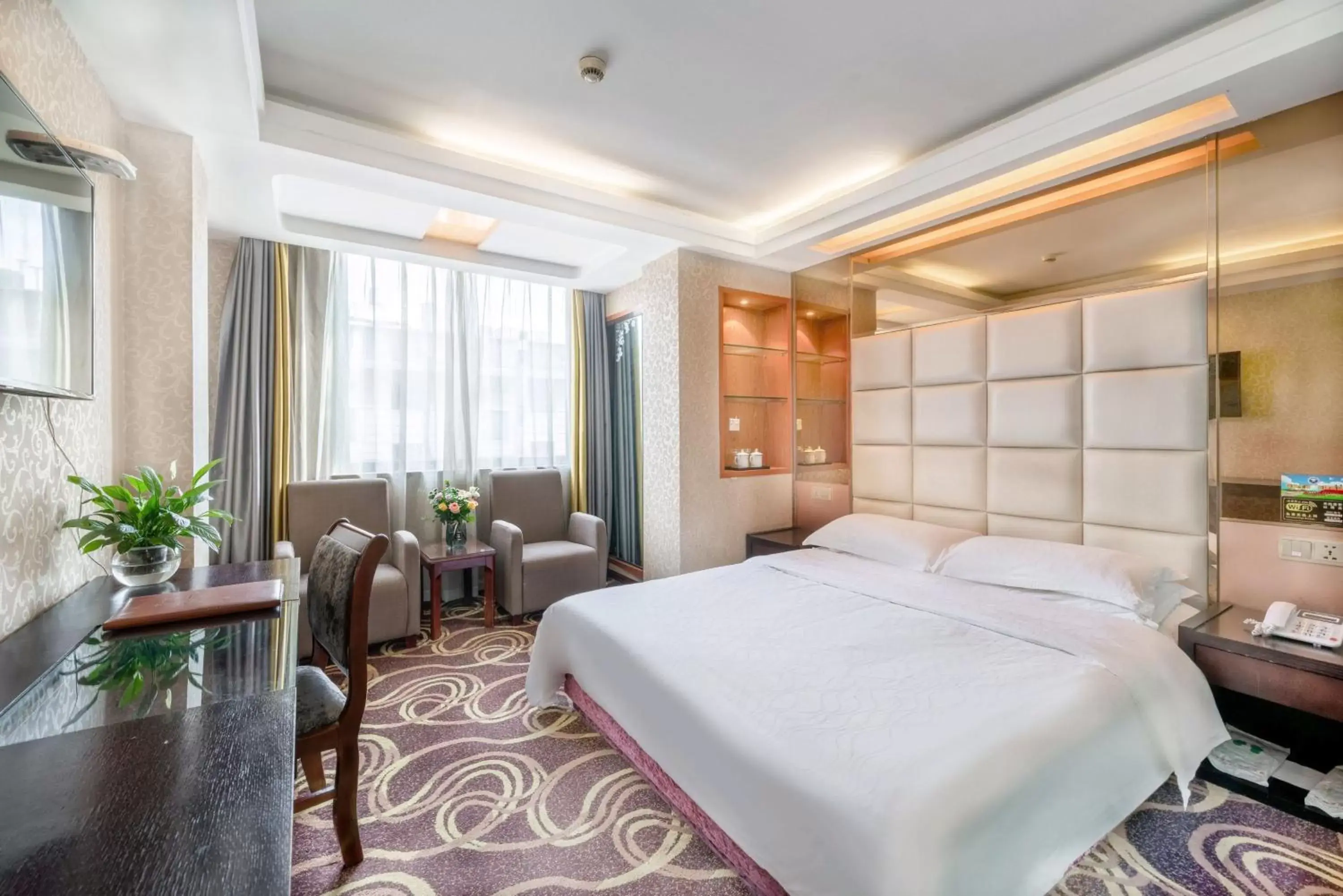 Bed in Yiwu Yuejia Business Hotel