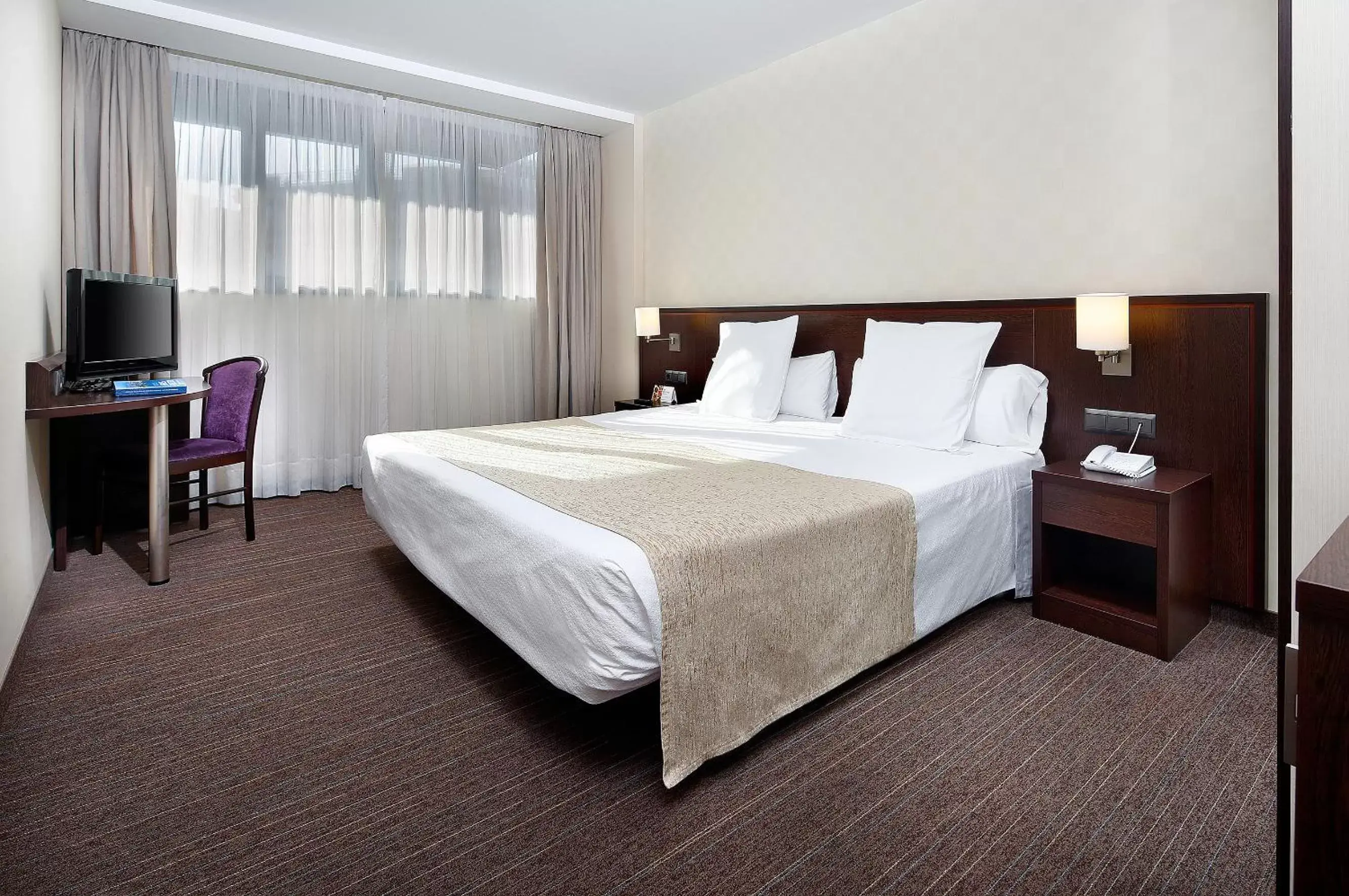 Bed in Hotel Lugano Barcelona