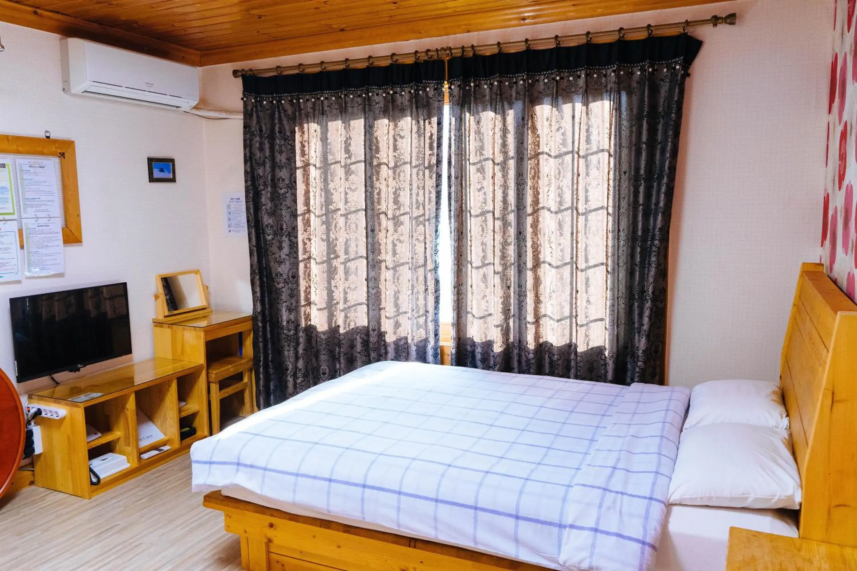 Bed in White Cabin