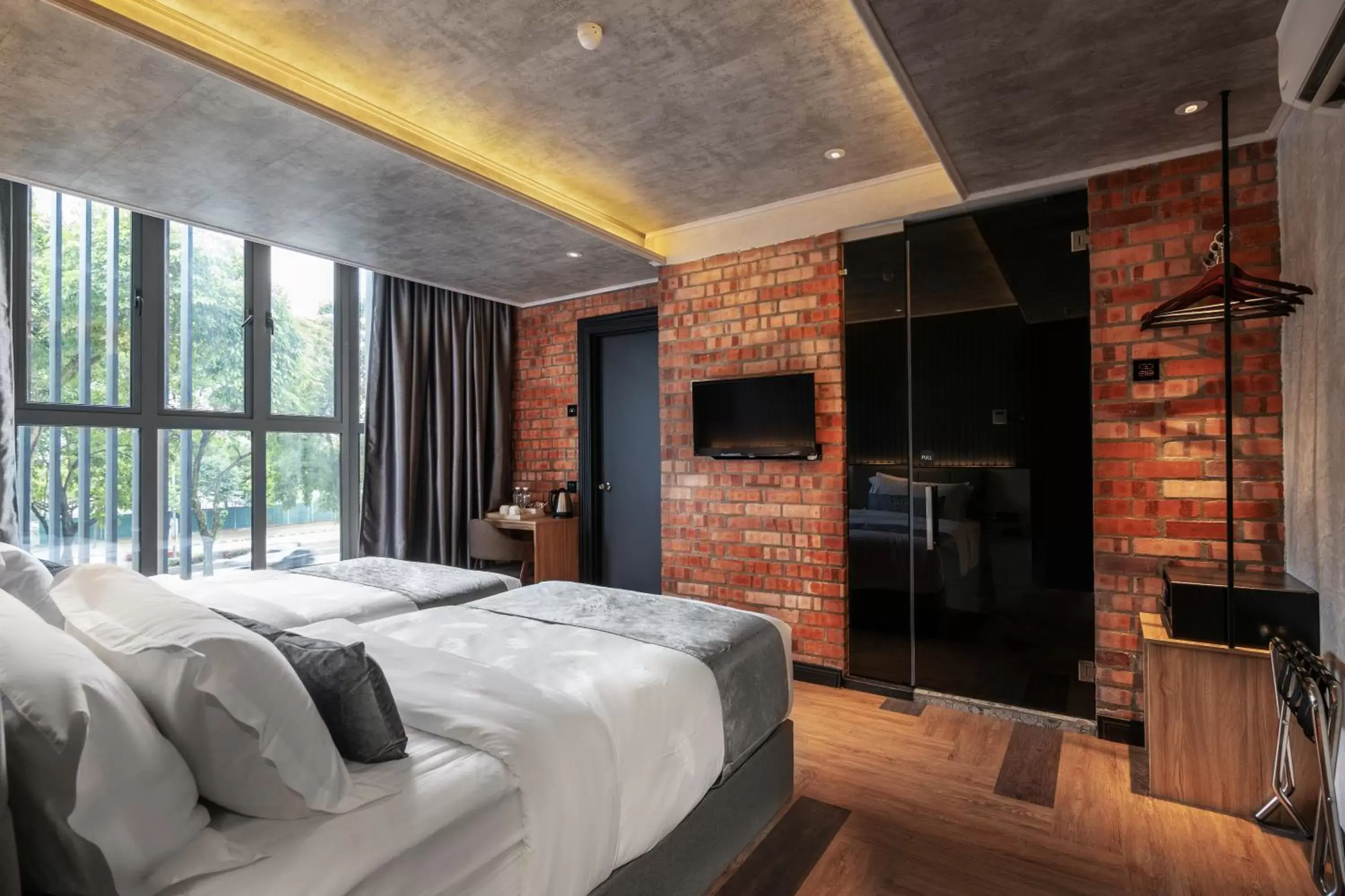 Bedroom in A&R Urban Hotel