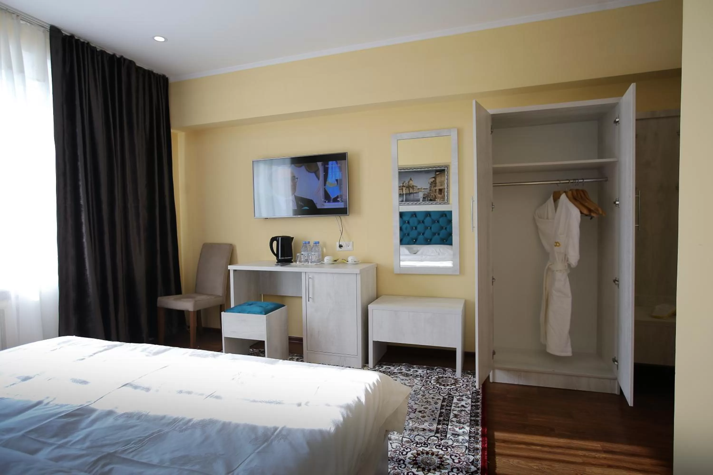 Bed in Altai Business Hotel