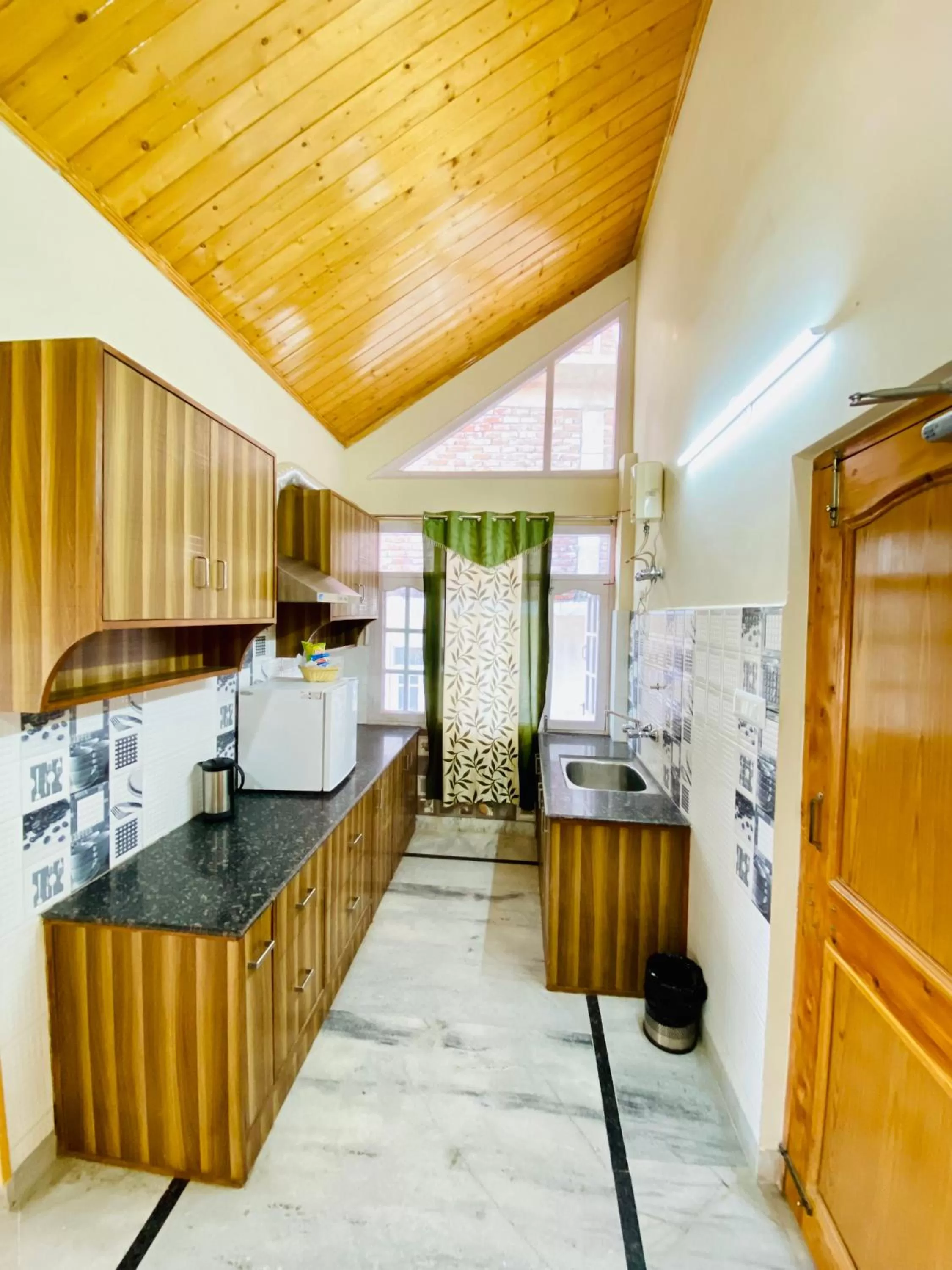 Kitchen or kitchenette, Kitchen/Kitchenette in Sai Cottage Shimla