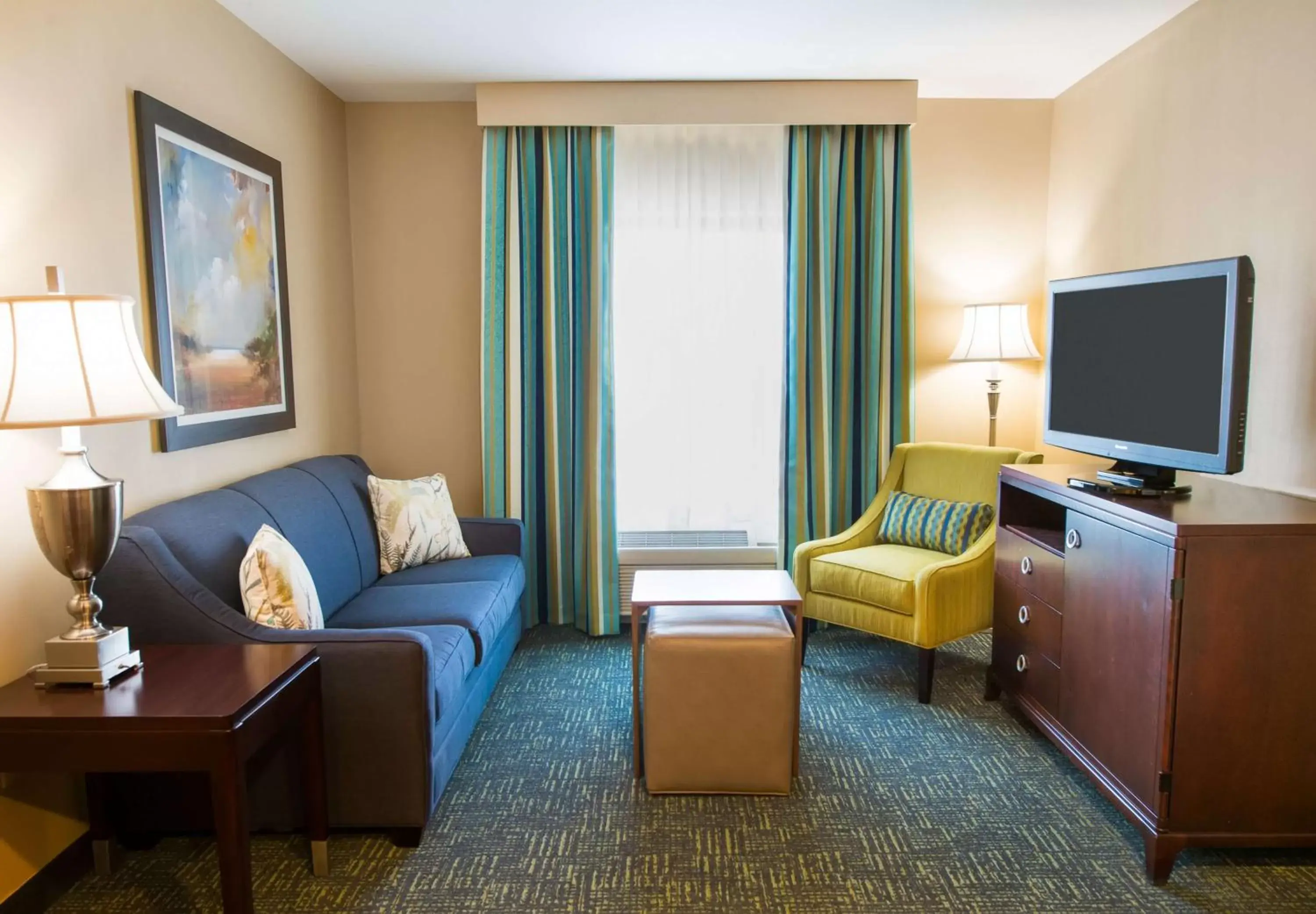 Living room, Seating Area in Homewood Suites by Hilton Davidson
