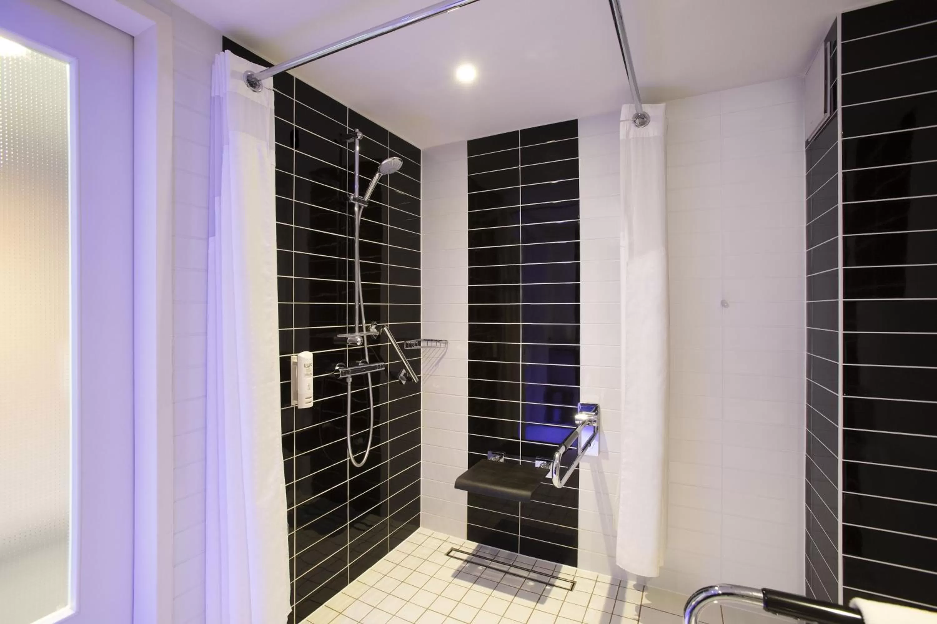 Bathroom in Holiday Inn Express Neunkirchen by IHG