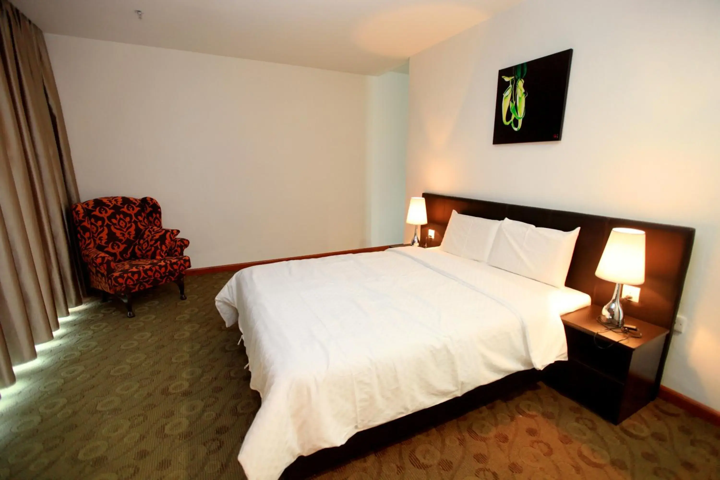 Bed in Merdeka Suites Hotel