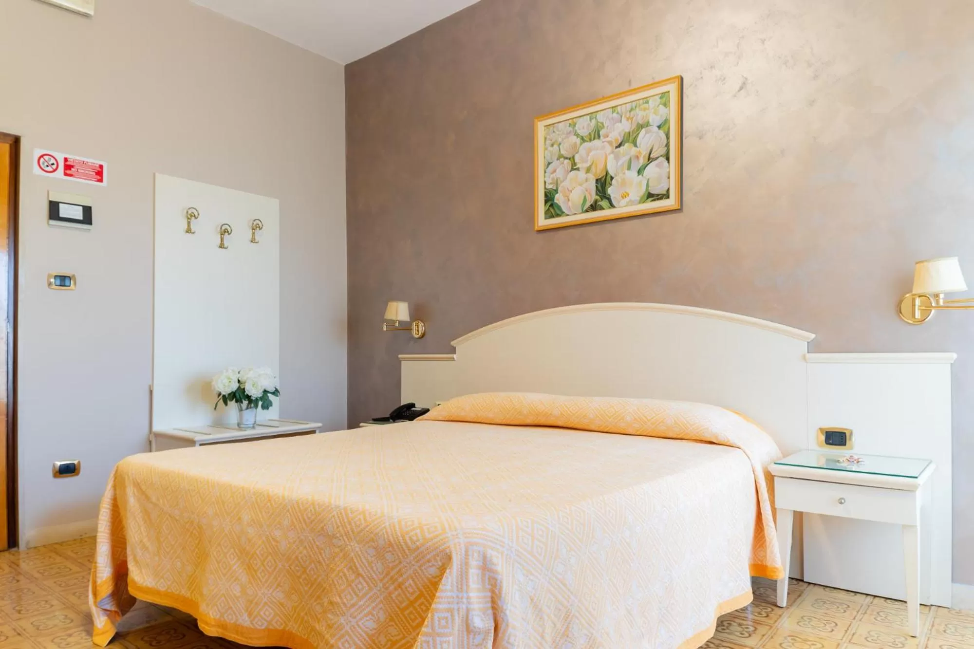 Bed in Hotel Riviera