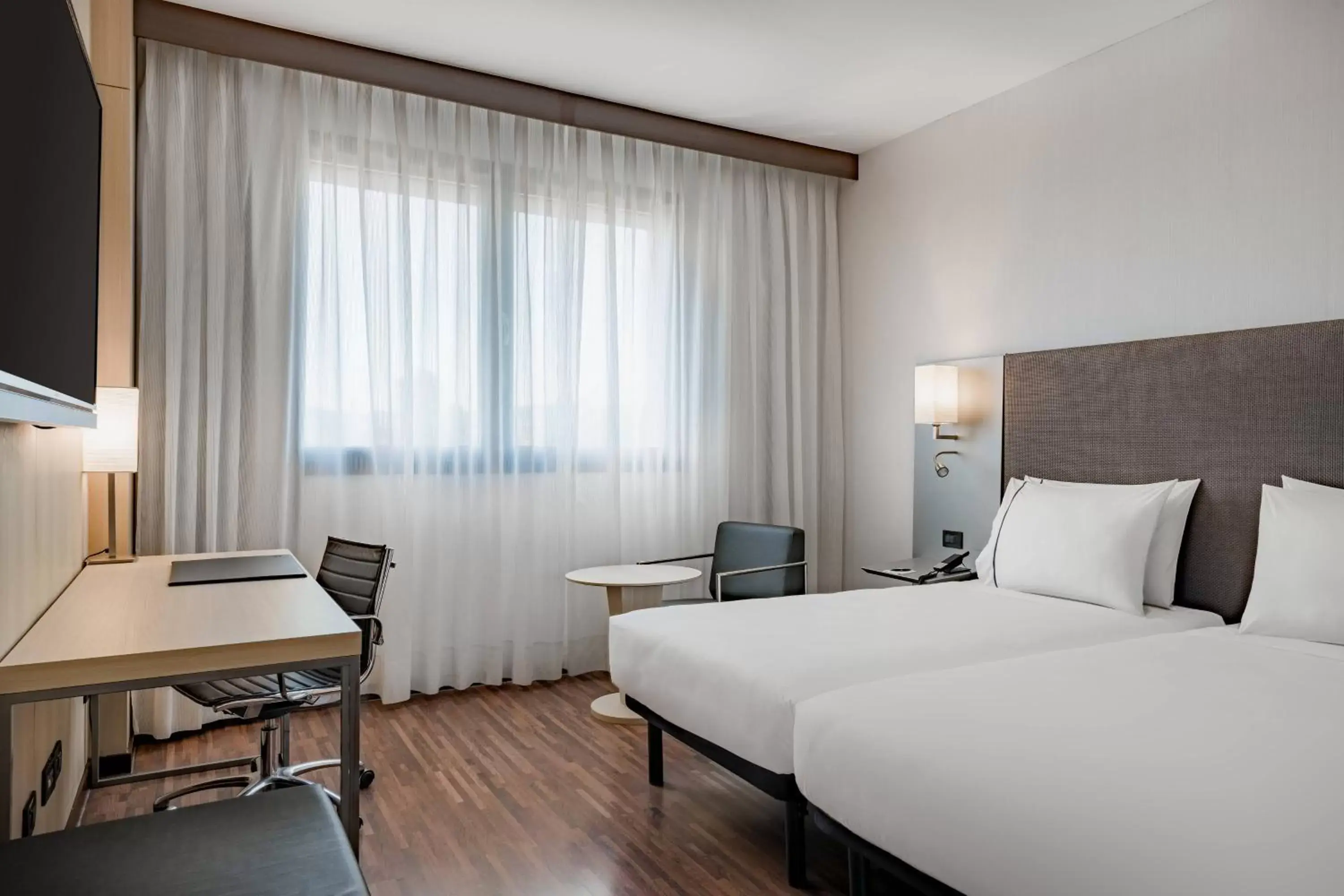 Photo of the whole room, Bed in AC Hotel Bologna by Marriott