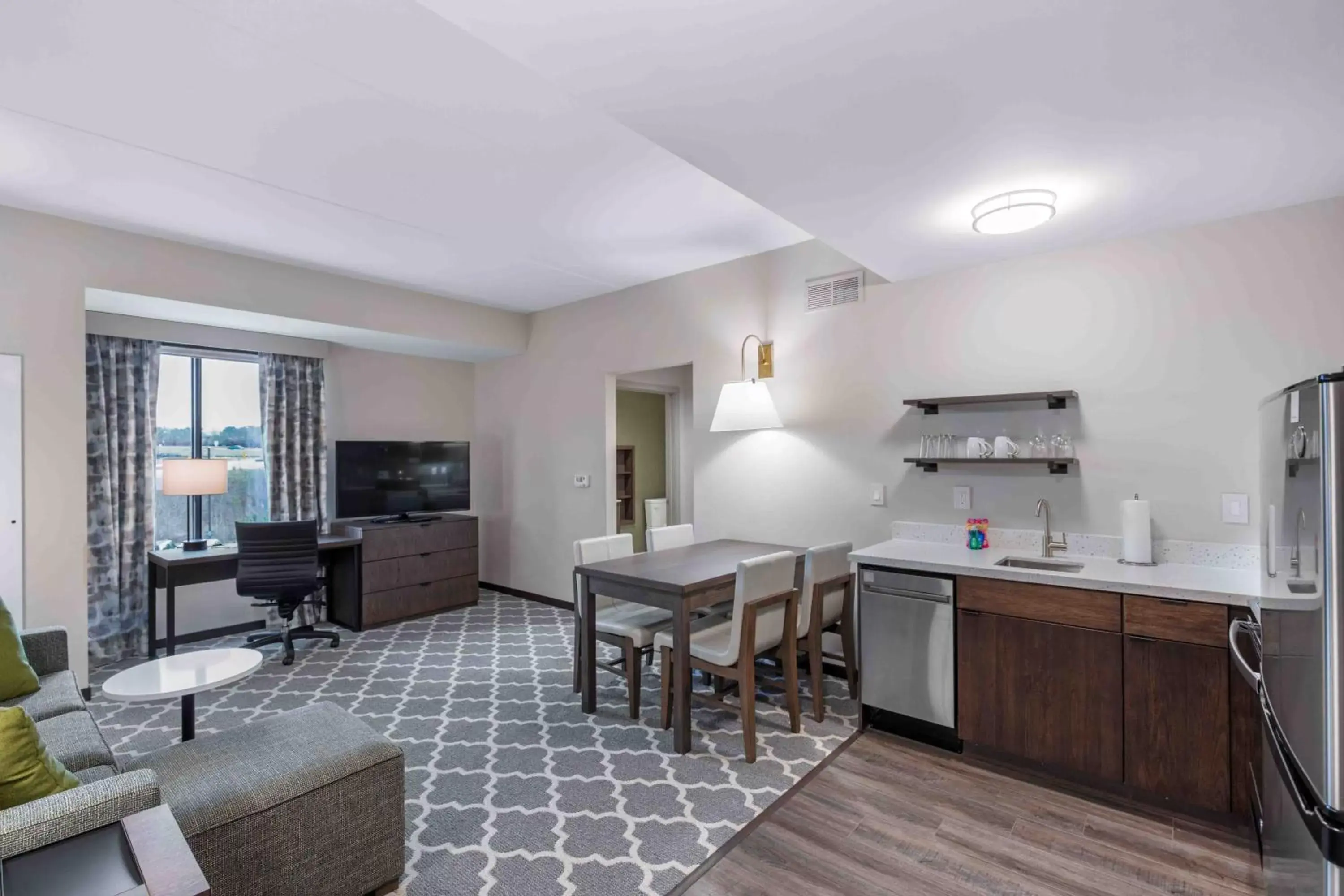 Living room, Kitchen/Kitchenette in Residence Inn by Marriott Atlanta Covington