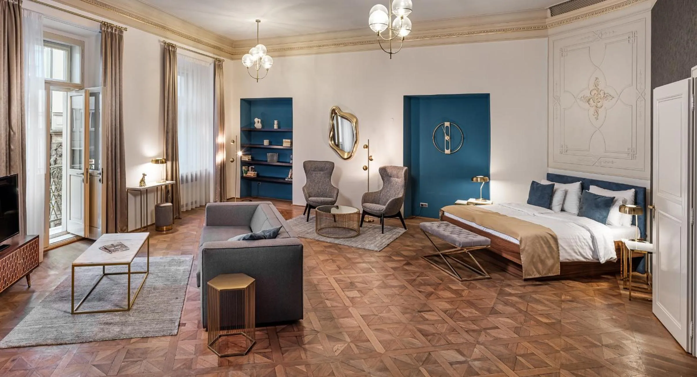 Photo of the whole room, Bed in Golden Angel Suites by Adrez