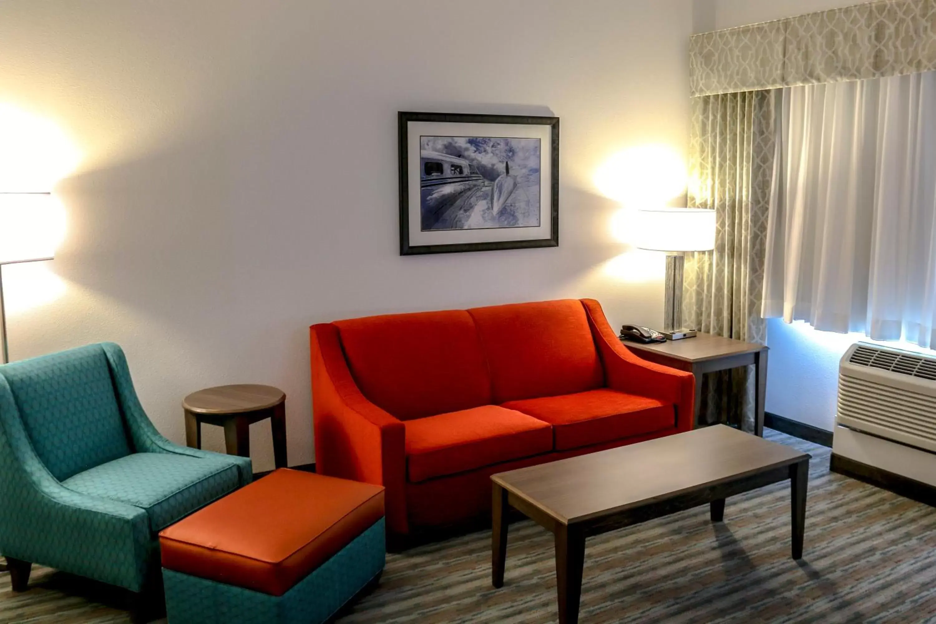 Bedroom, Seating Area in Holiday Inn Hotel & Suites Denver Tech Center-Centennial, an IHG Hotel