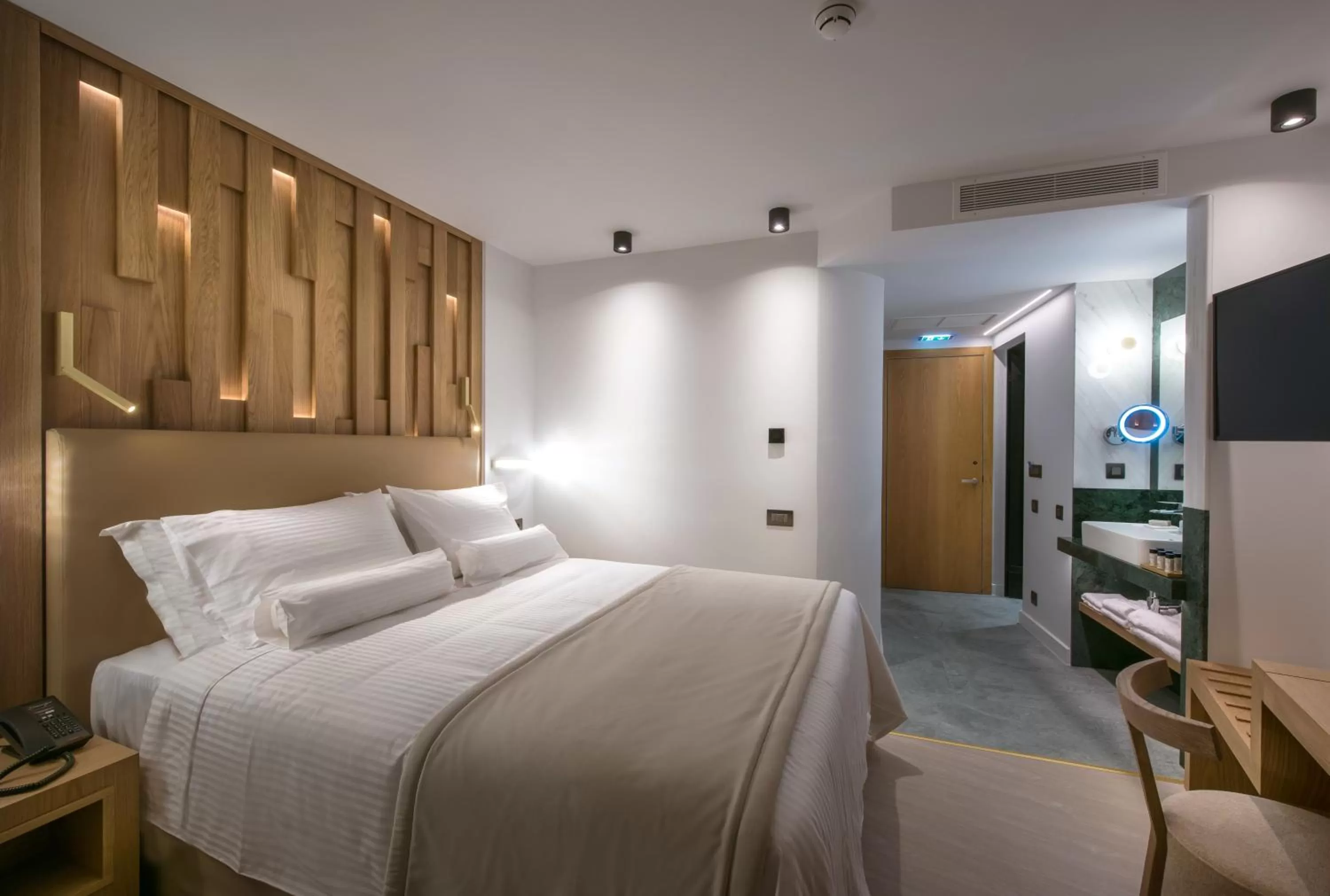 Bed in Dimargio Luxury Hotel & Spa