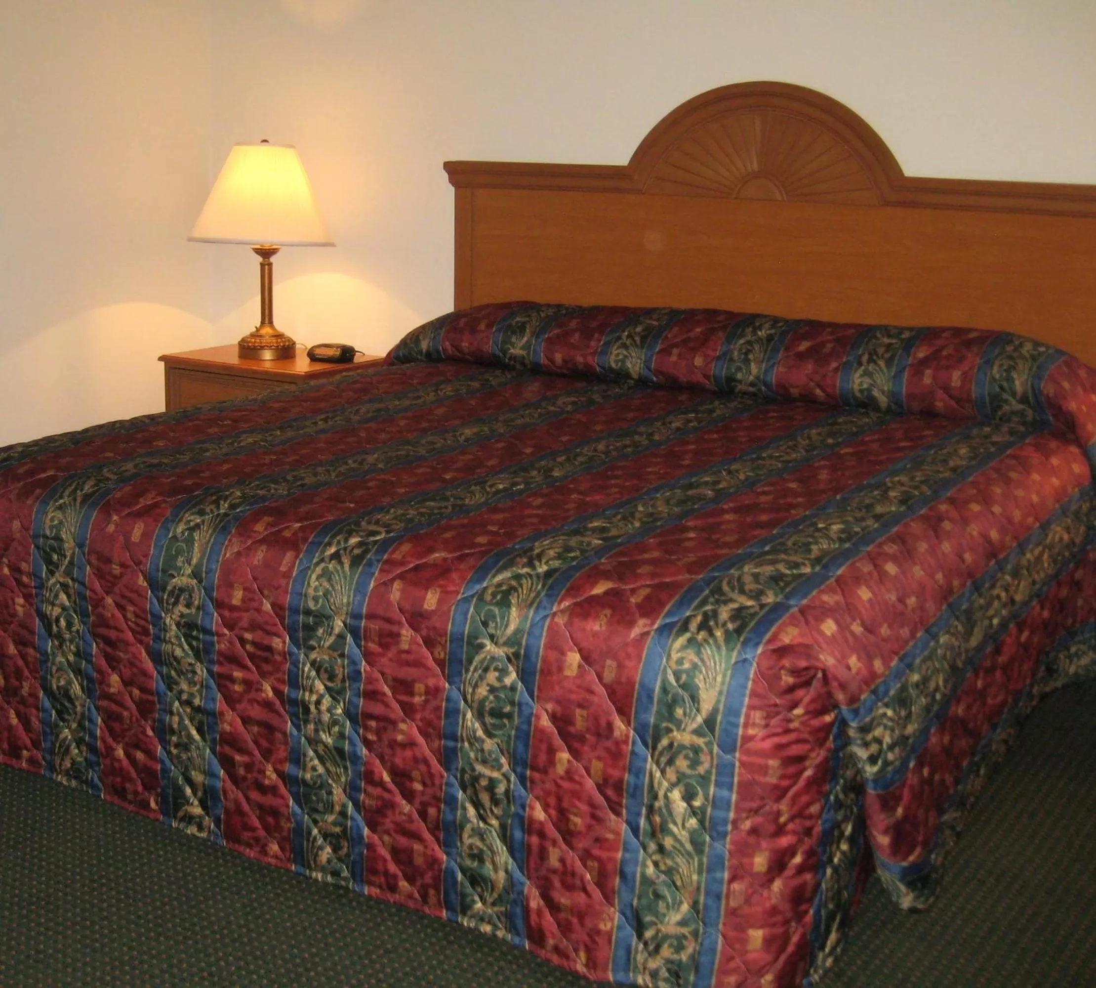 Bed in Horizon Inn & Suites