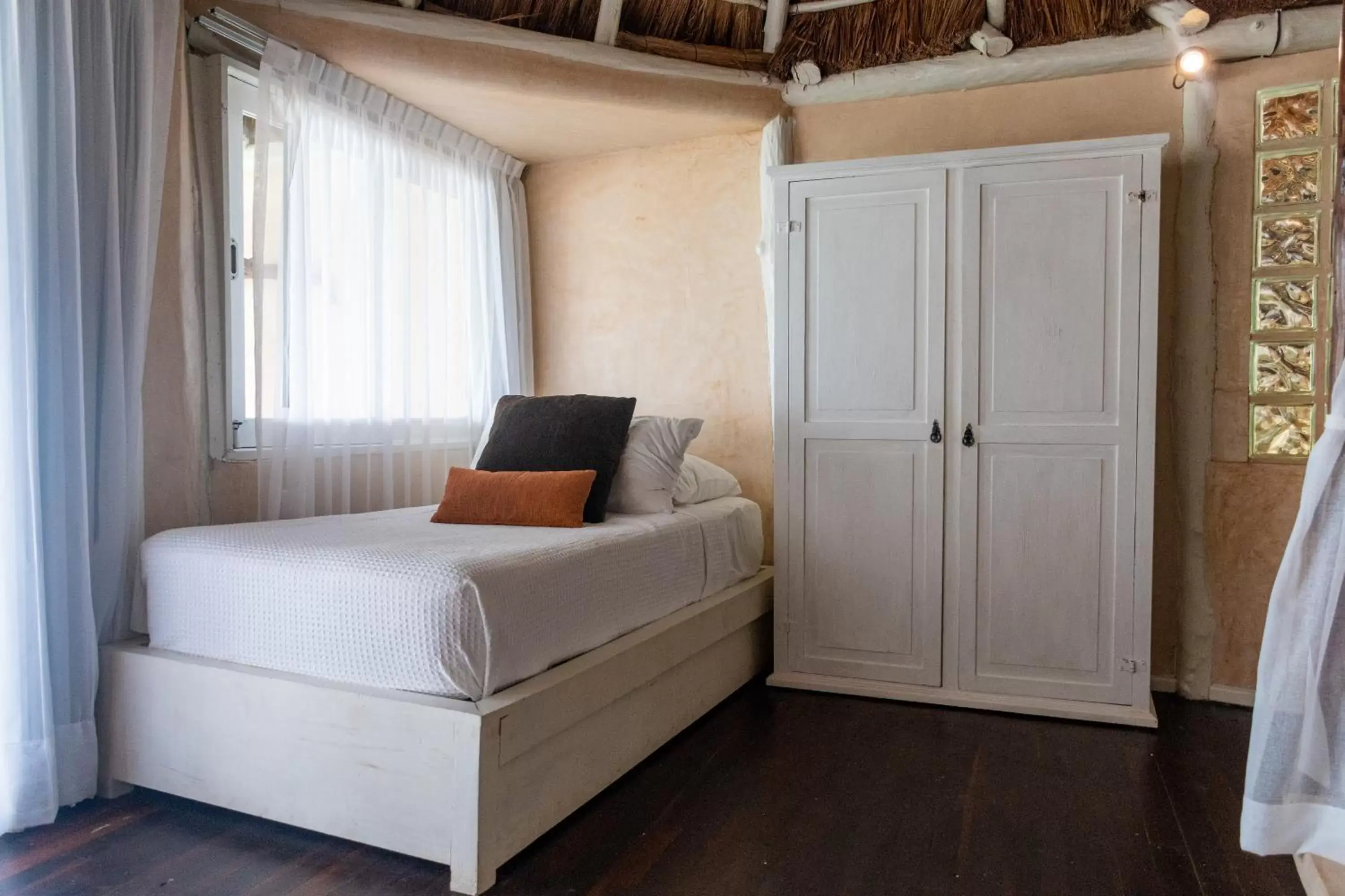 Bed in Villa Las Estrellas Tulum - located at the party zone