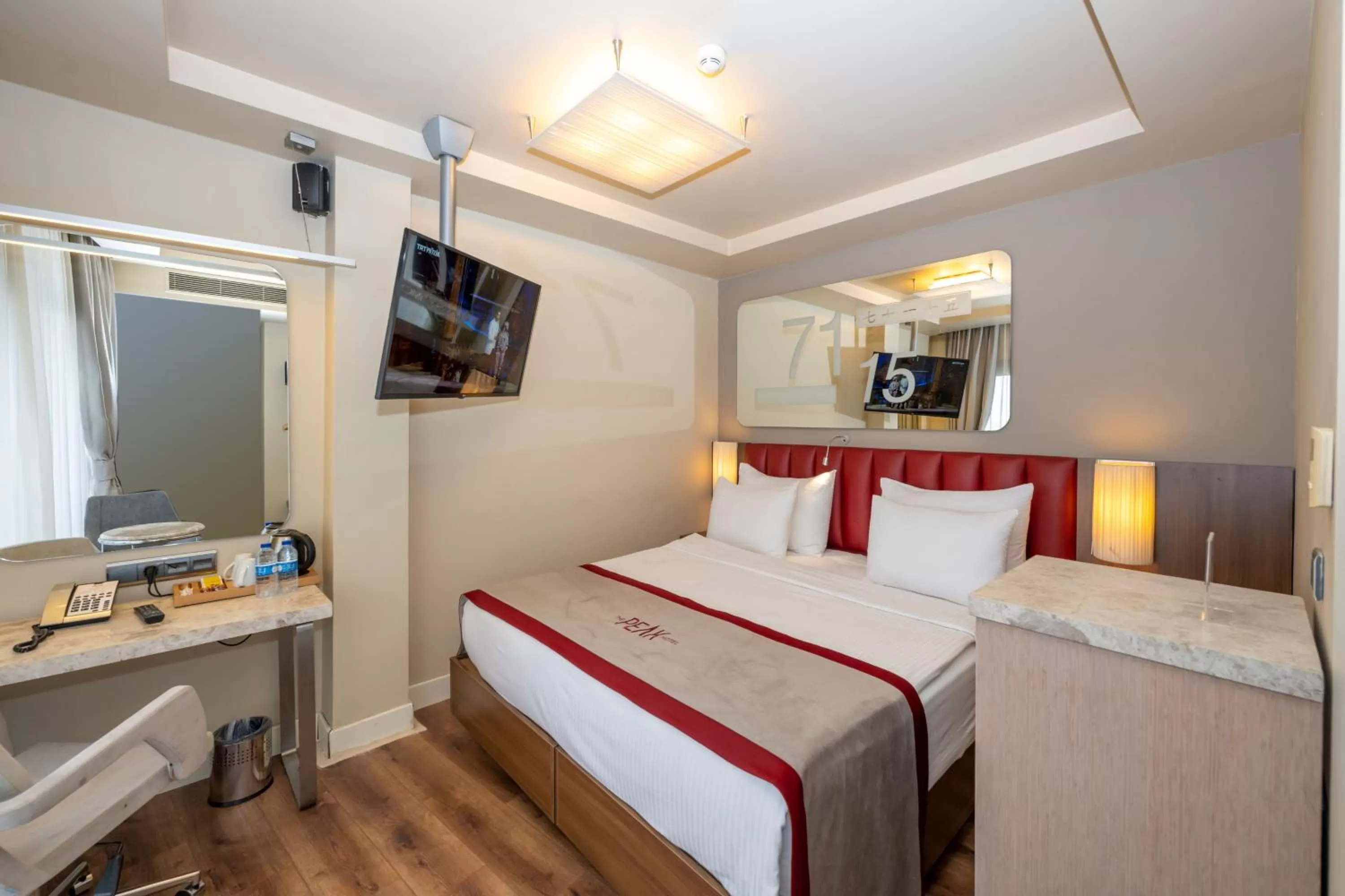 Kitchen or kitchenette, Bed in Ramada By Wyndham Istanbul Pera Taksim