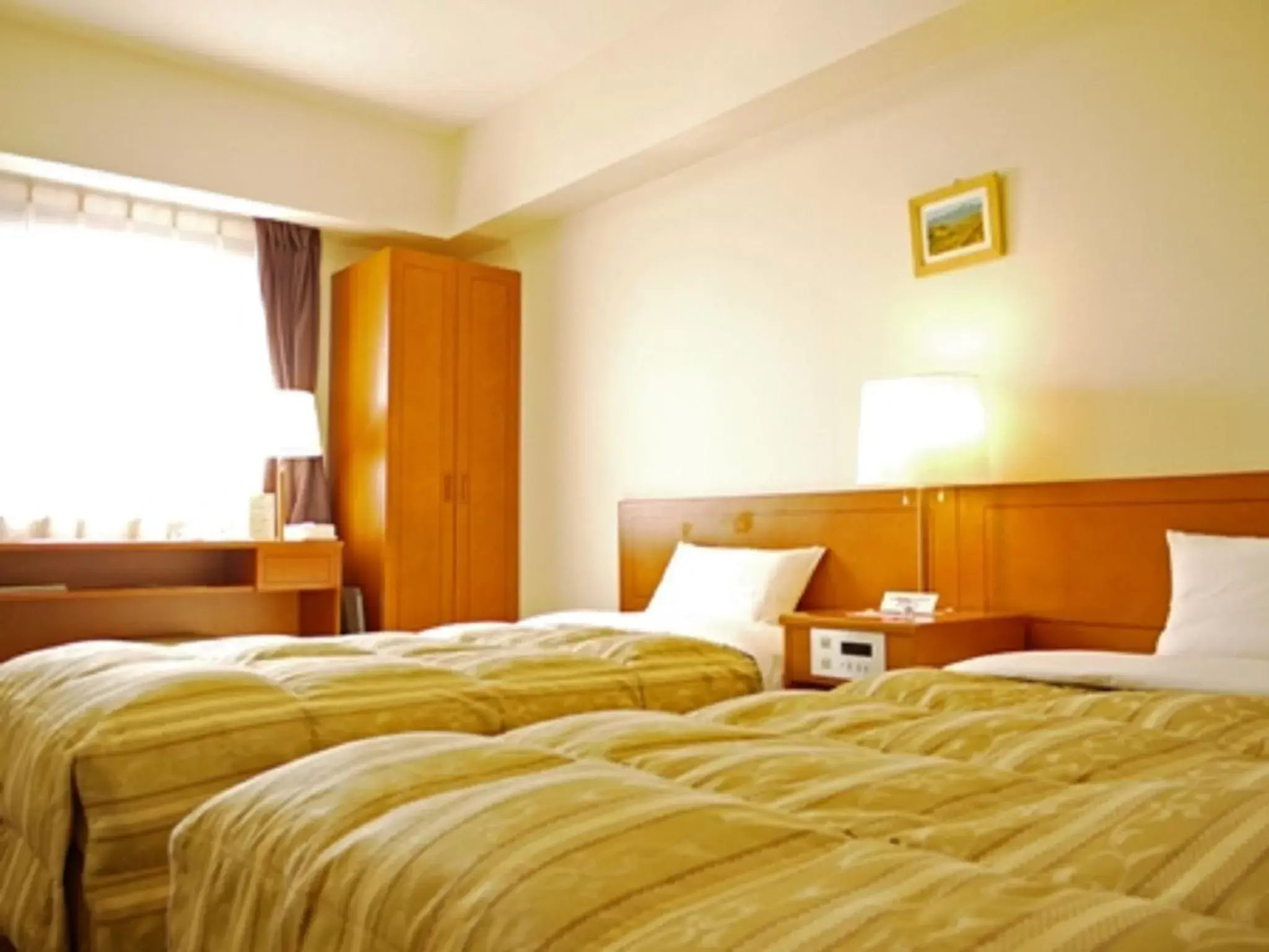 Bed in Hotel Route-Inn Asahikawa Ekimae Ichijodori