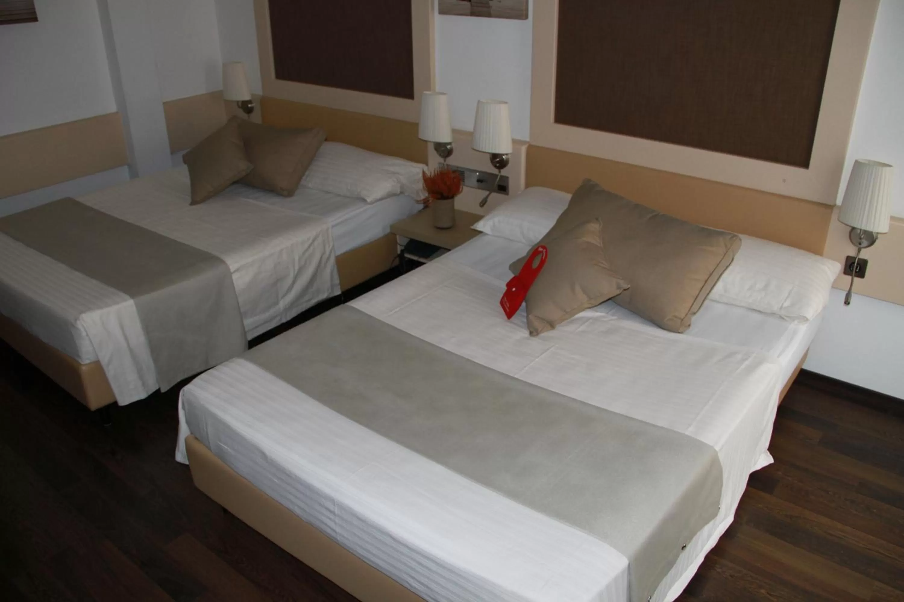 Bed in Enjoy 1313AG Hotel Touring
