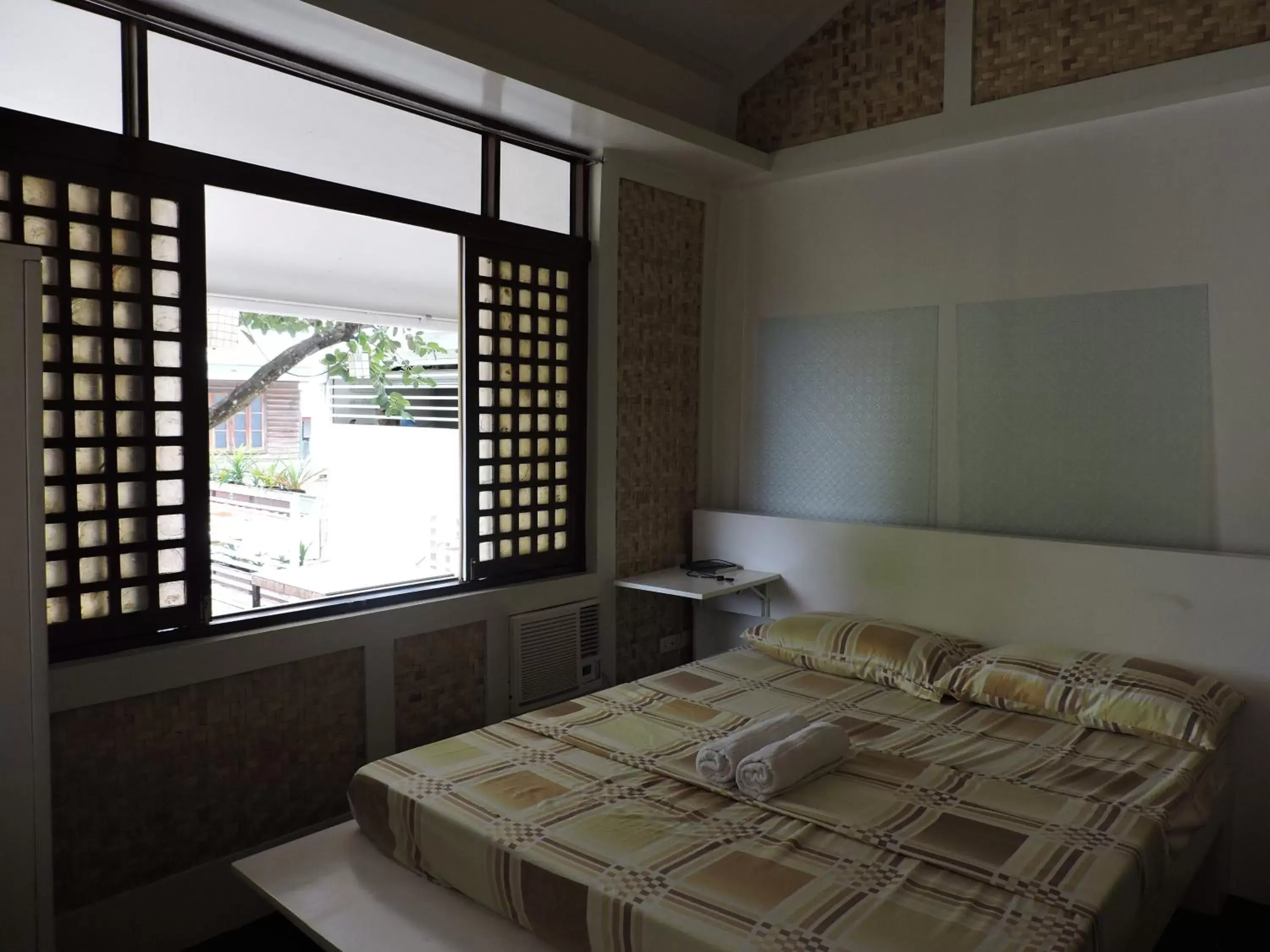 Photo of the whole room, Bed in Orange Mangrove Pension House