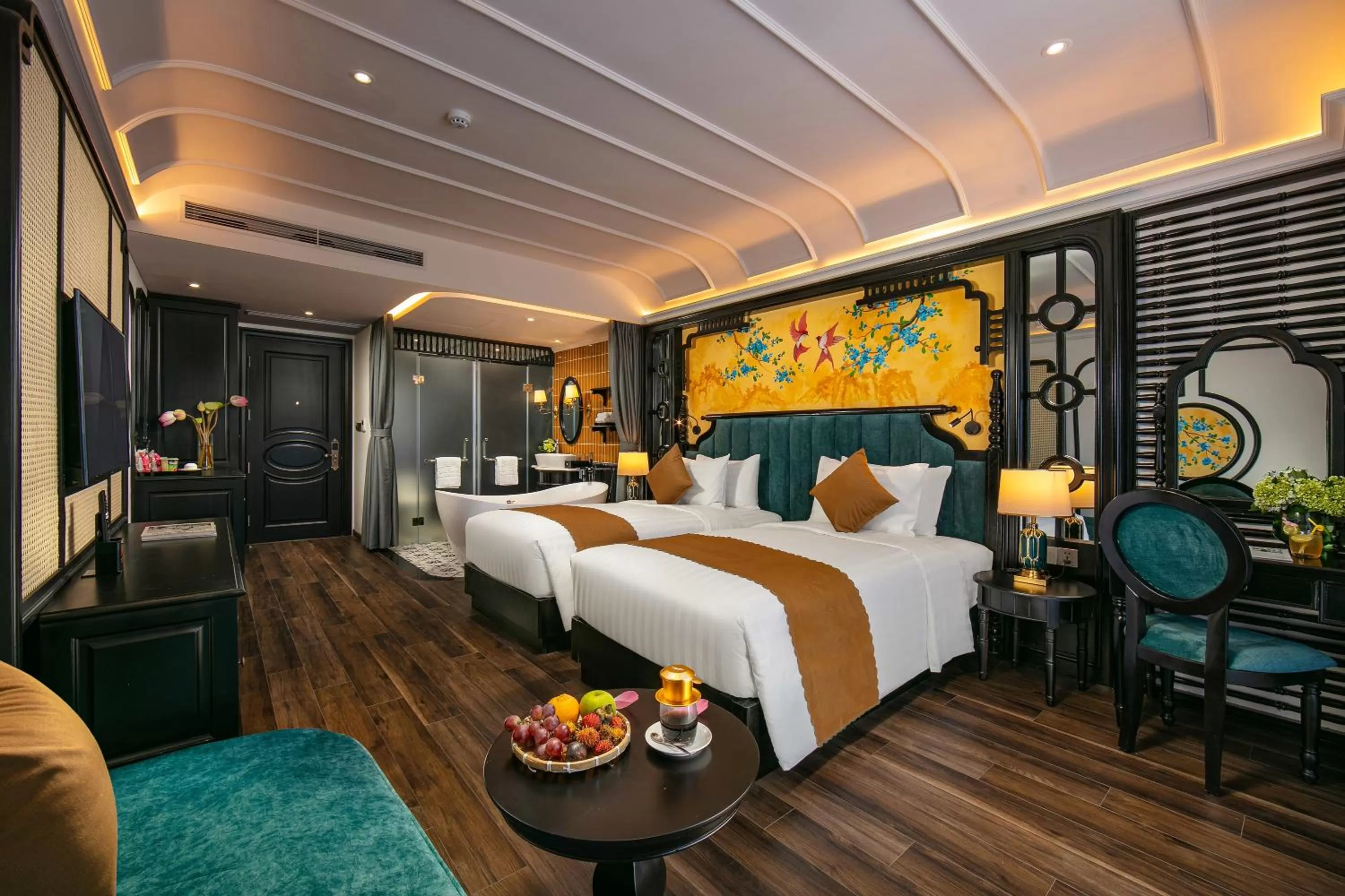 Bed in Grand Sunrise Palace Hoi An- A Luxury Indochine Hotel & Spa