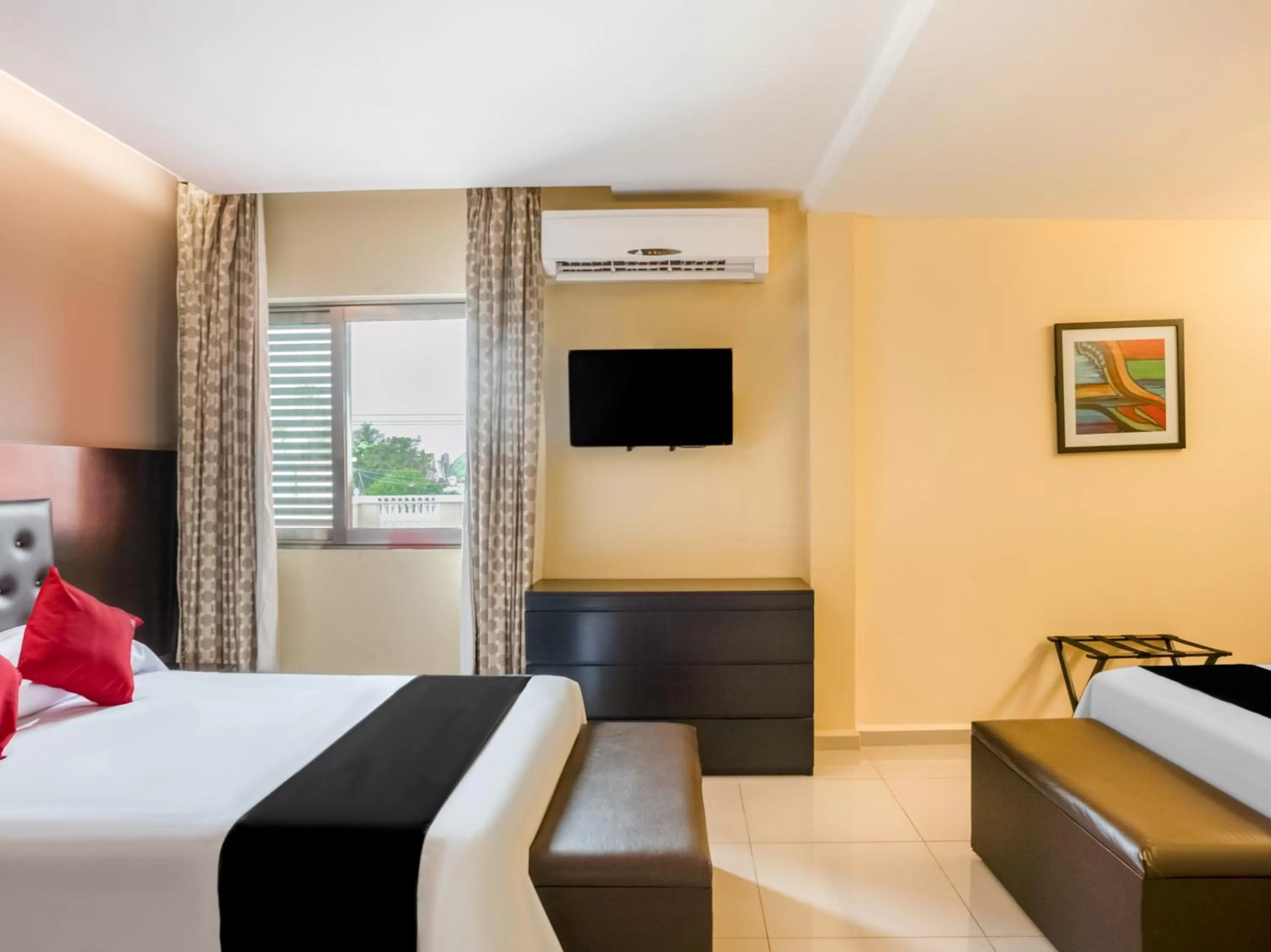 Bed in Veracruz Suites Hotel