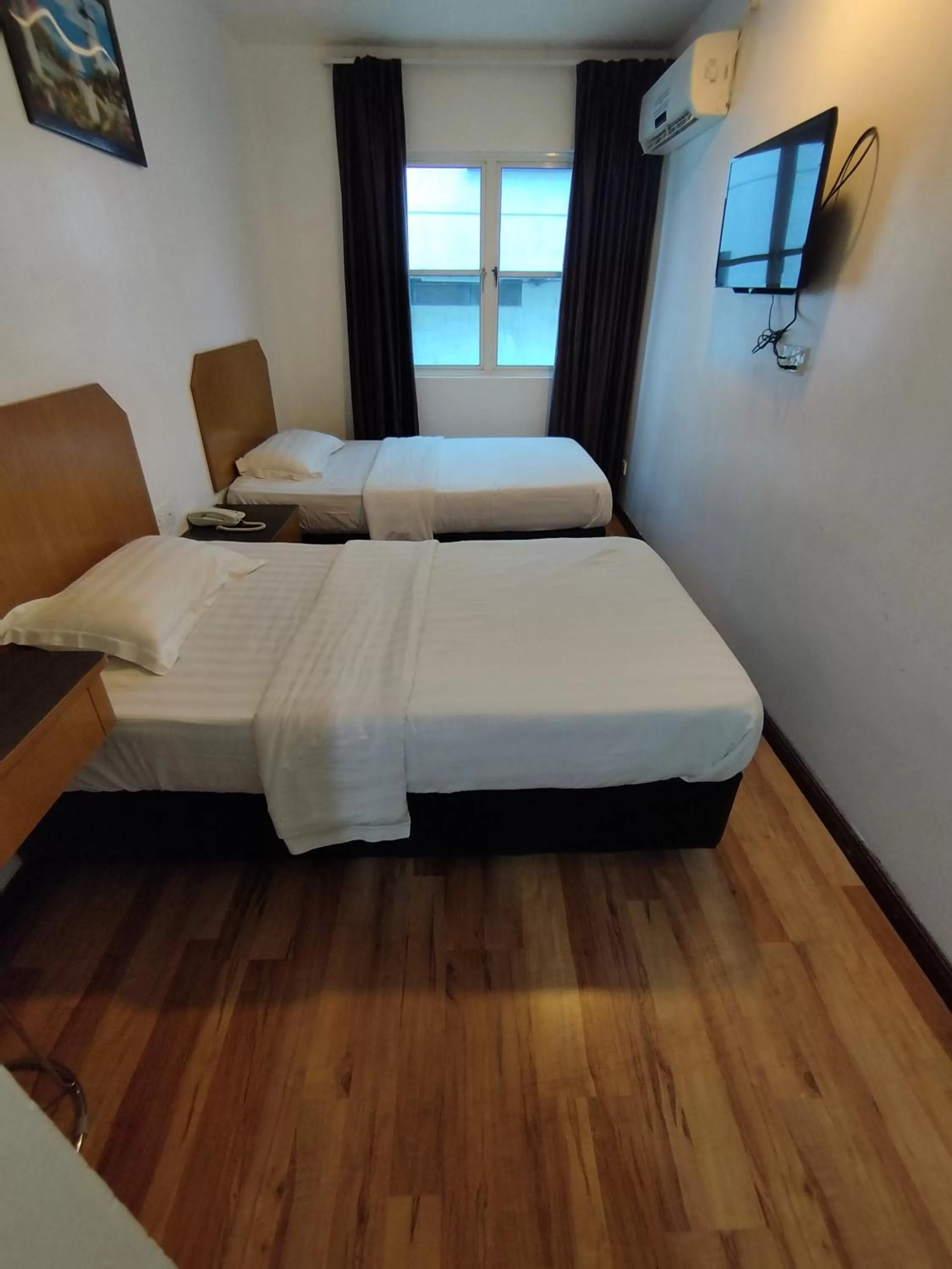 Bed in Marine Bay Hotel