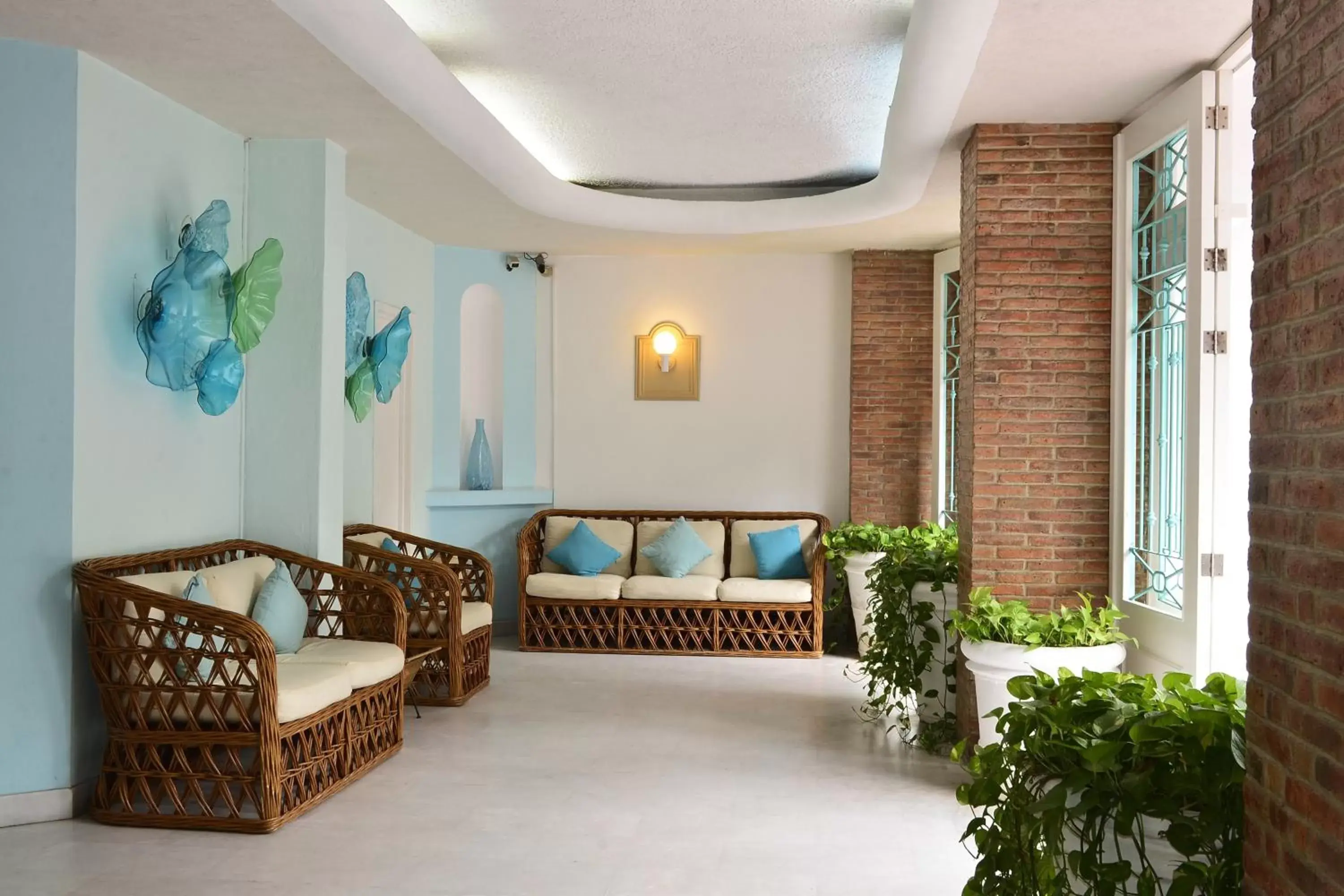 Communal lounge/ TV room, Seating Area in Emperador Vallarta Beachfront Hotel and Suites