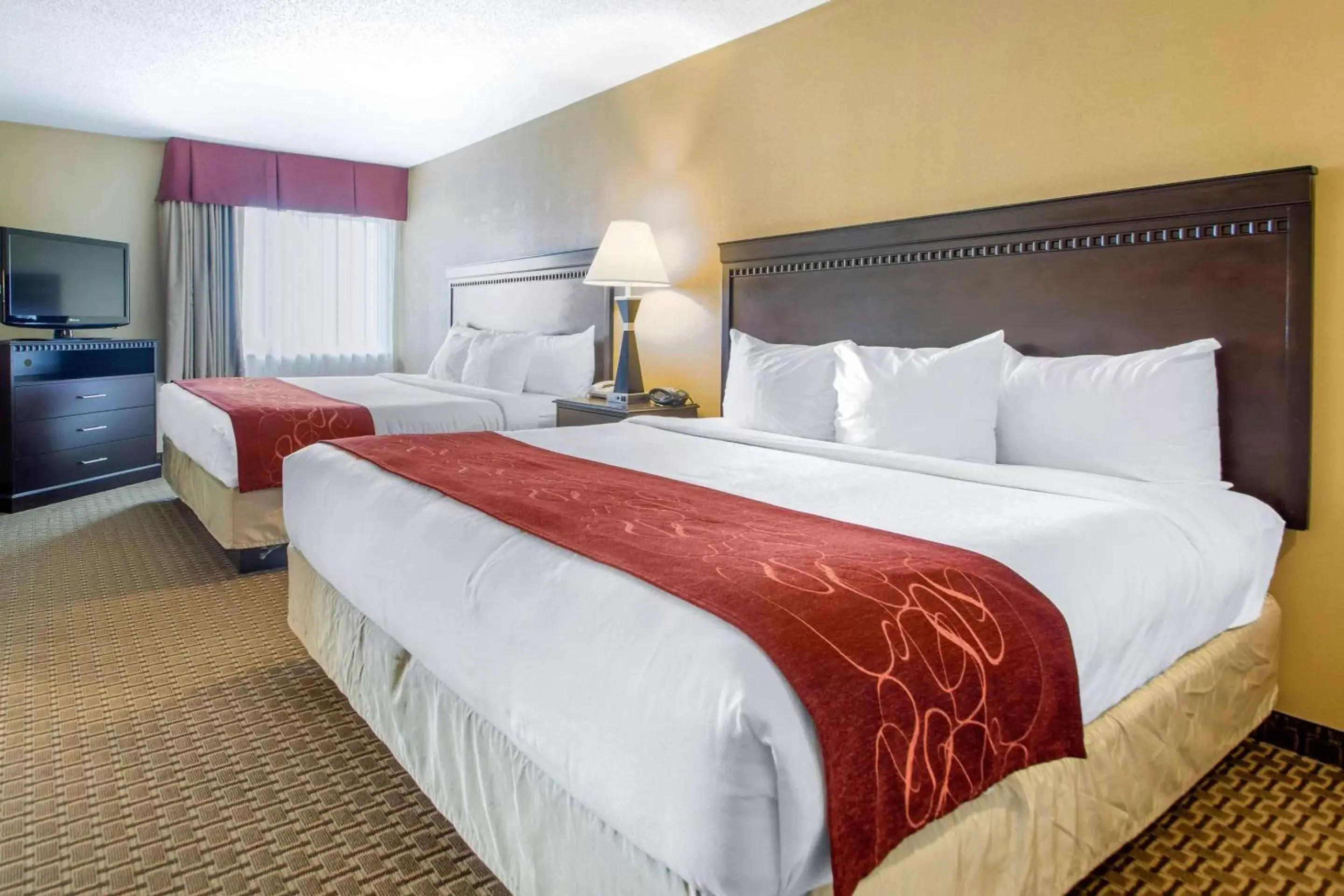 Bed in Comfort Suites Wisconsin Dells Area
