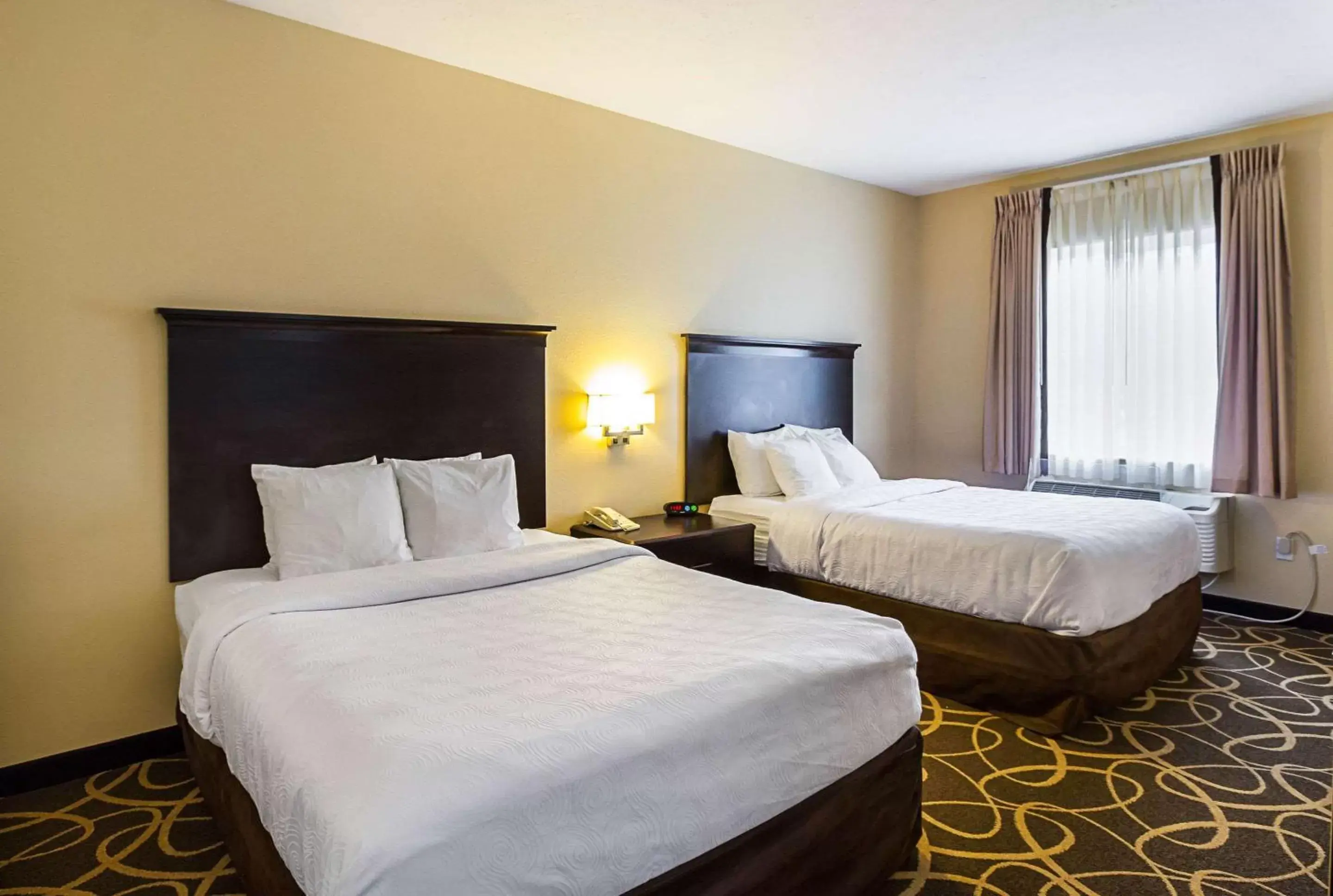 Bedroom, Bed in MainStay Suites Fargo - I-94 Medical Center