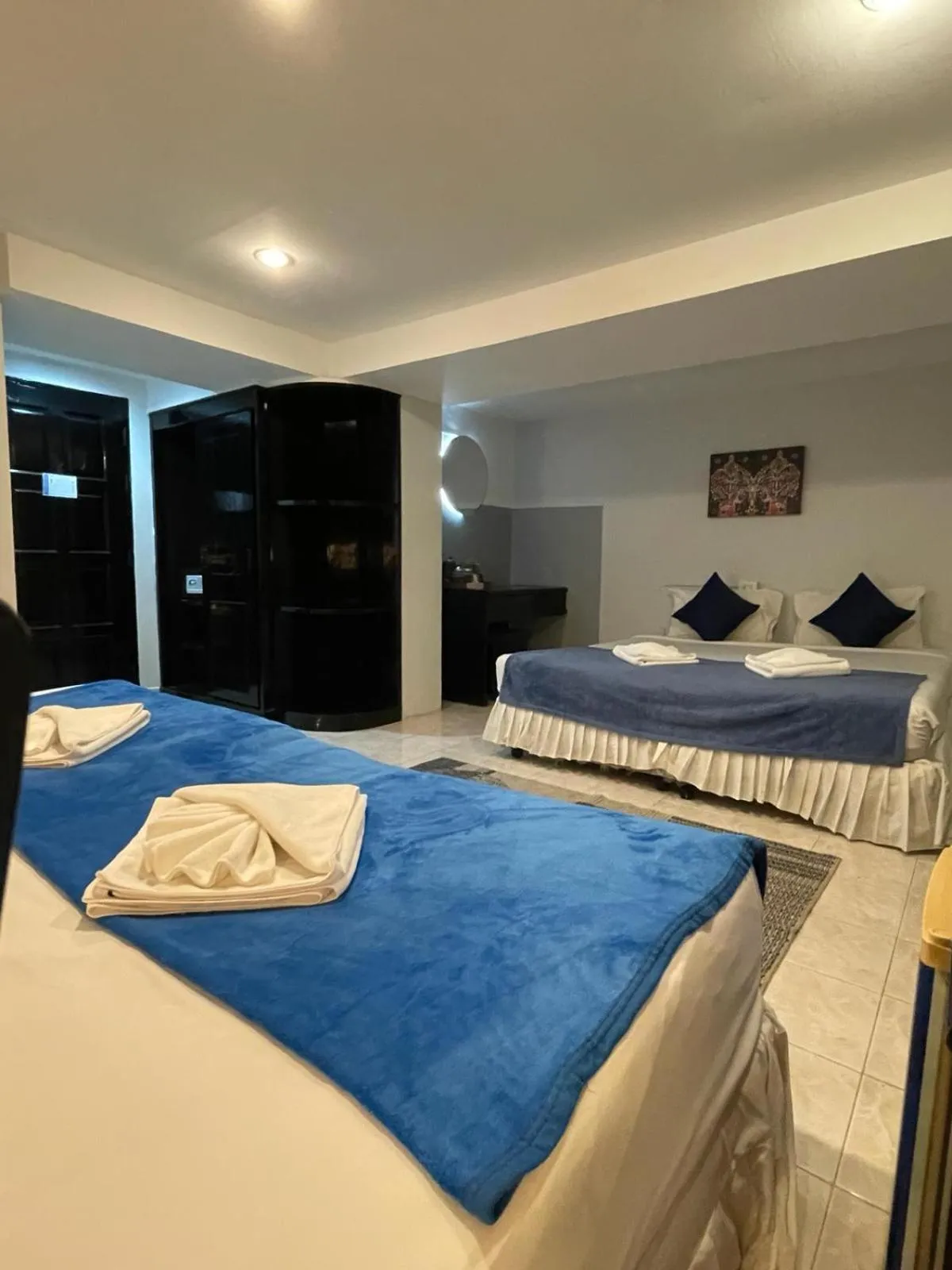 Photo of the whole room, Bed in BH Baan Paradise Hotel Patong