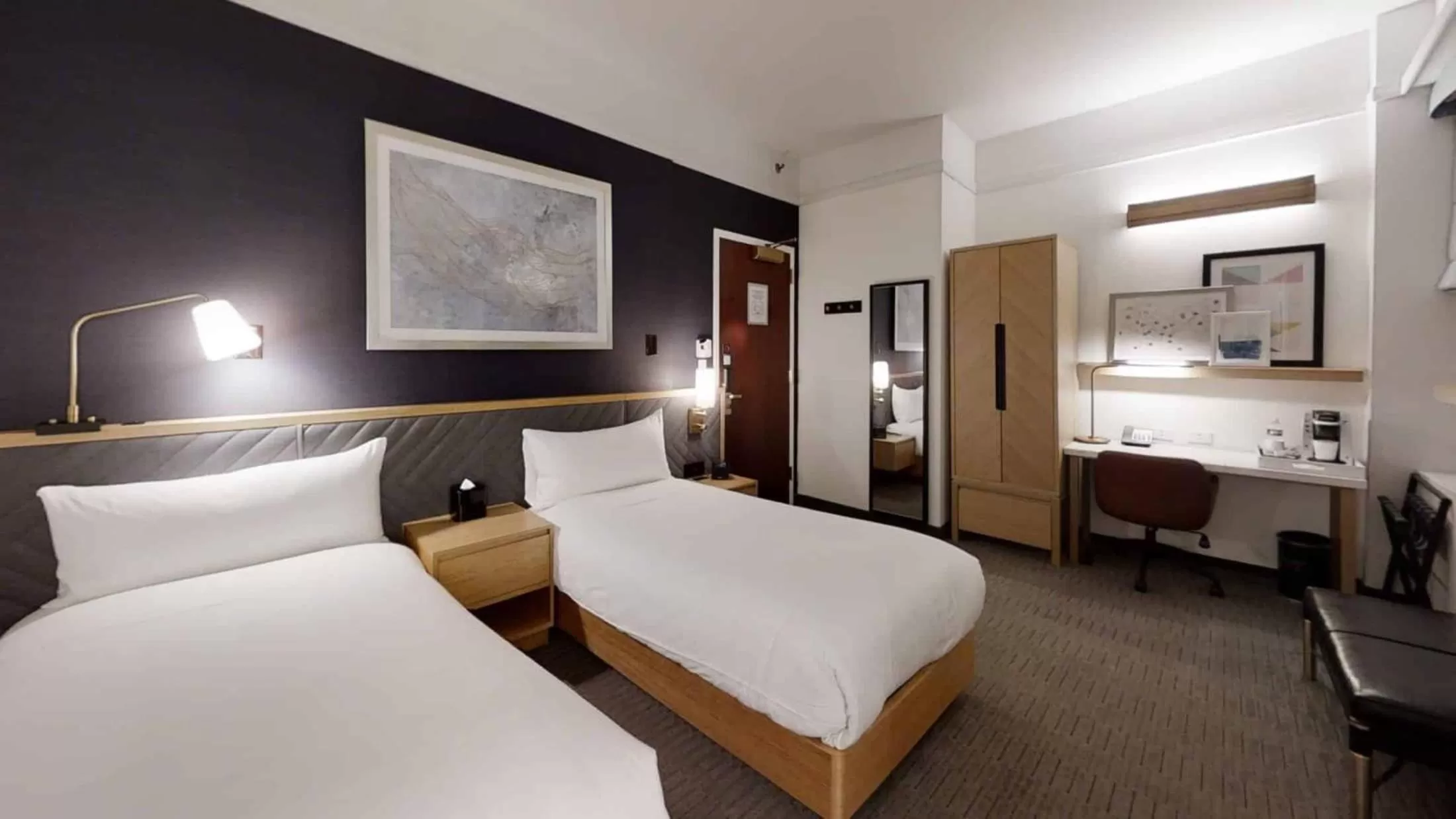 Bed in Club Quarters Hotel Times Square, New York