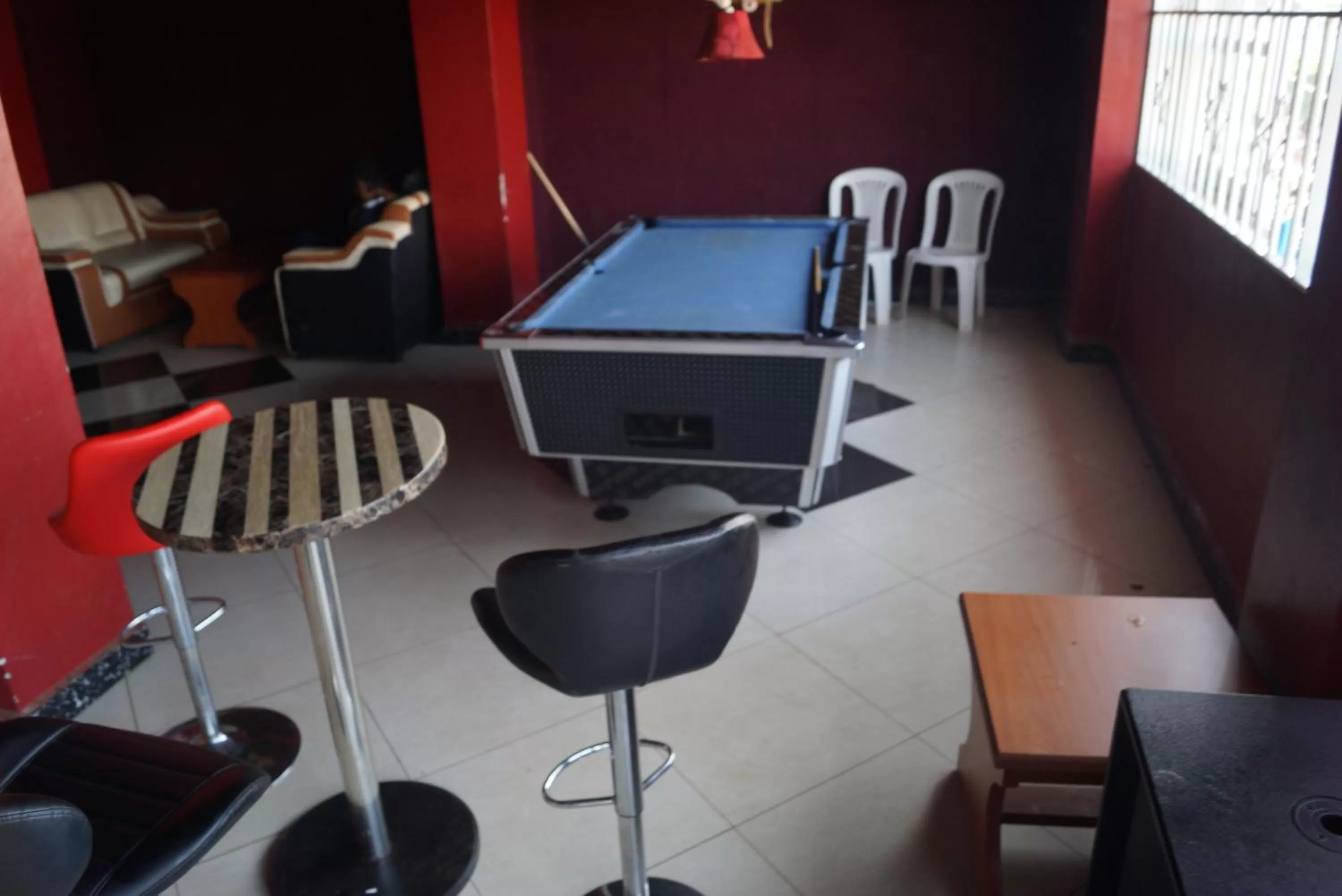 Communal lounge/ TV room in Sunrise Hotel Kampala