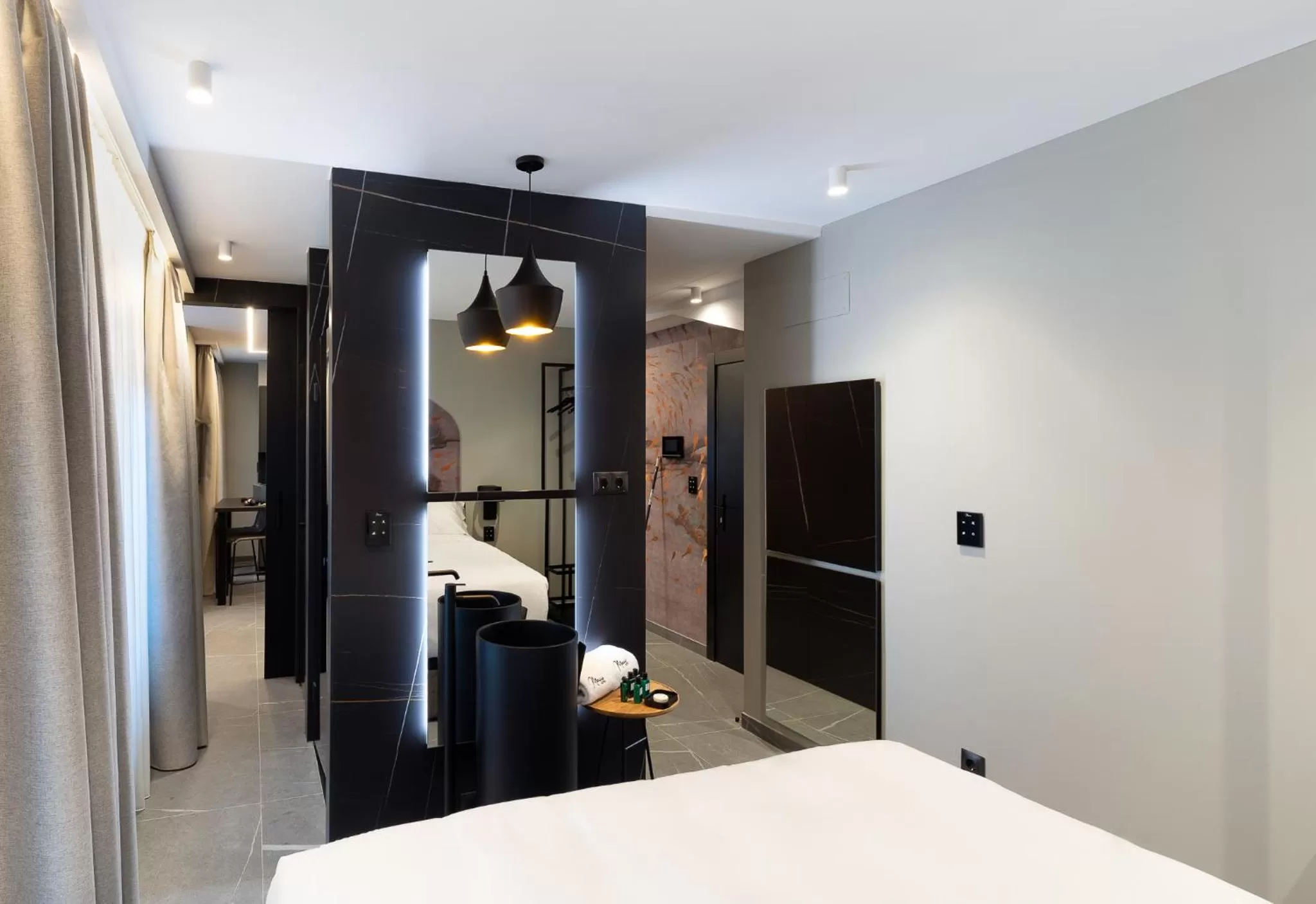 Toilet, Bed in Mauro Suites