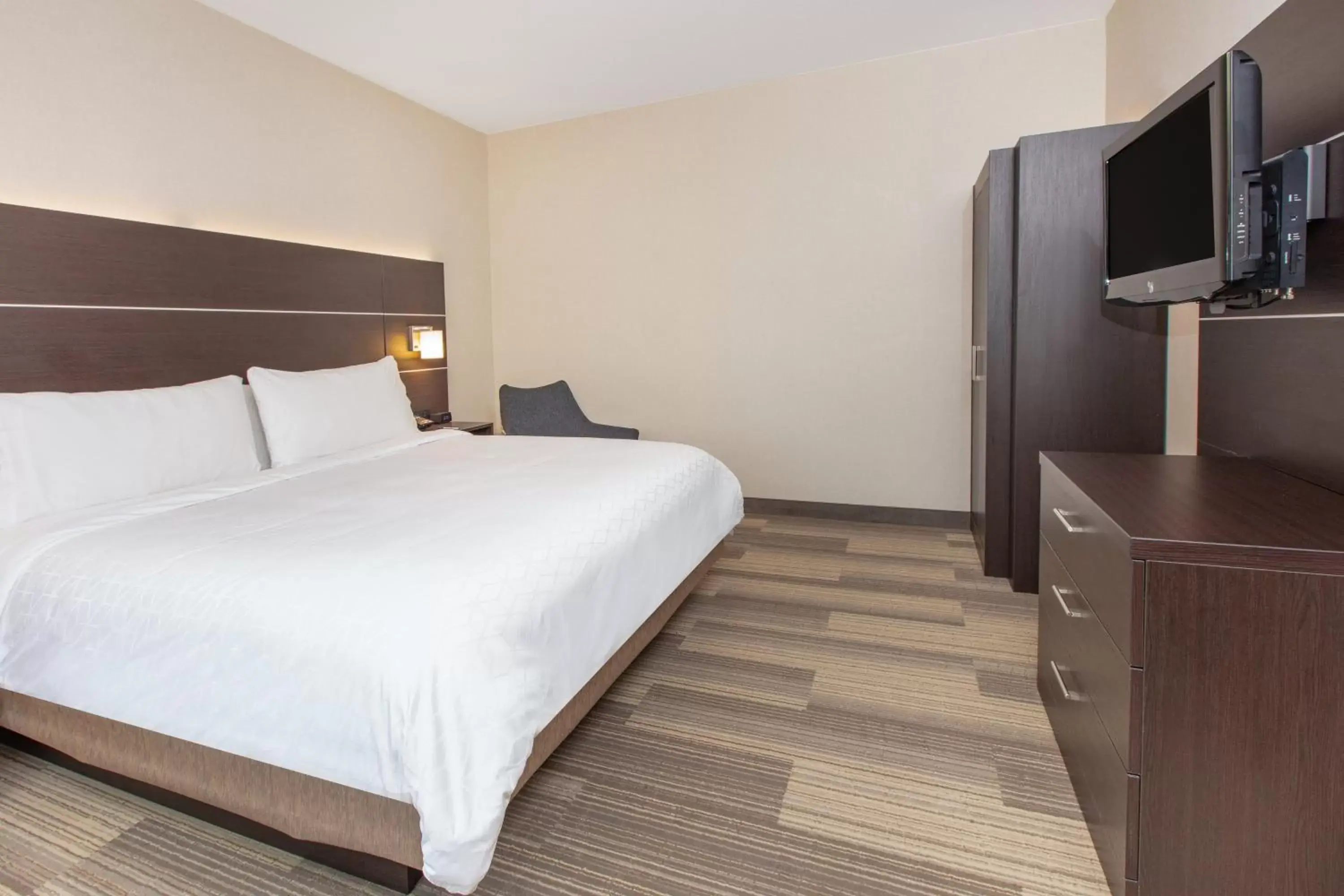 Photo of the whole room, Bed in Holiday Inn Express Hotel & Suites Seaside Convention Center, an IHG Hotel