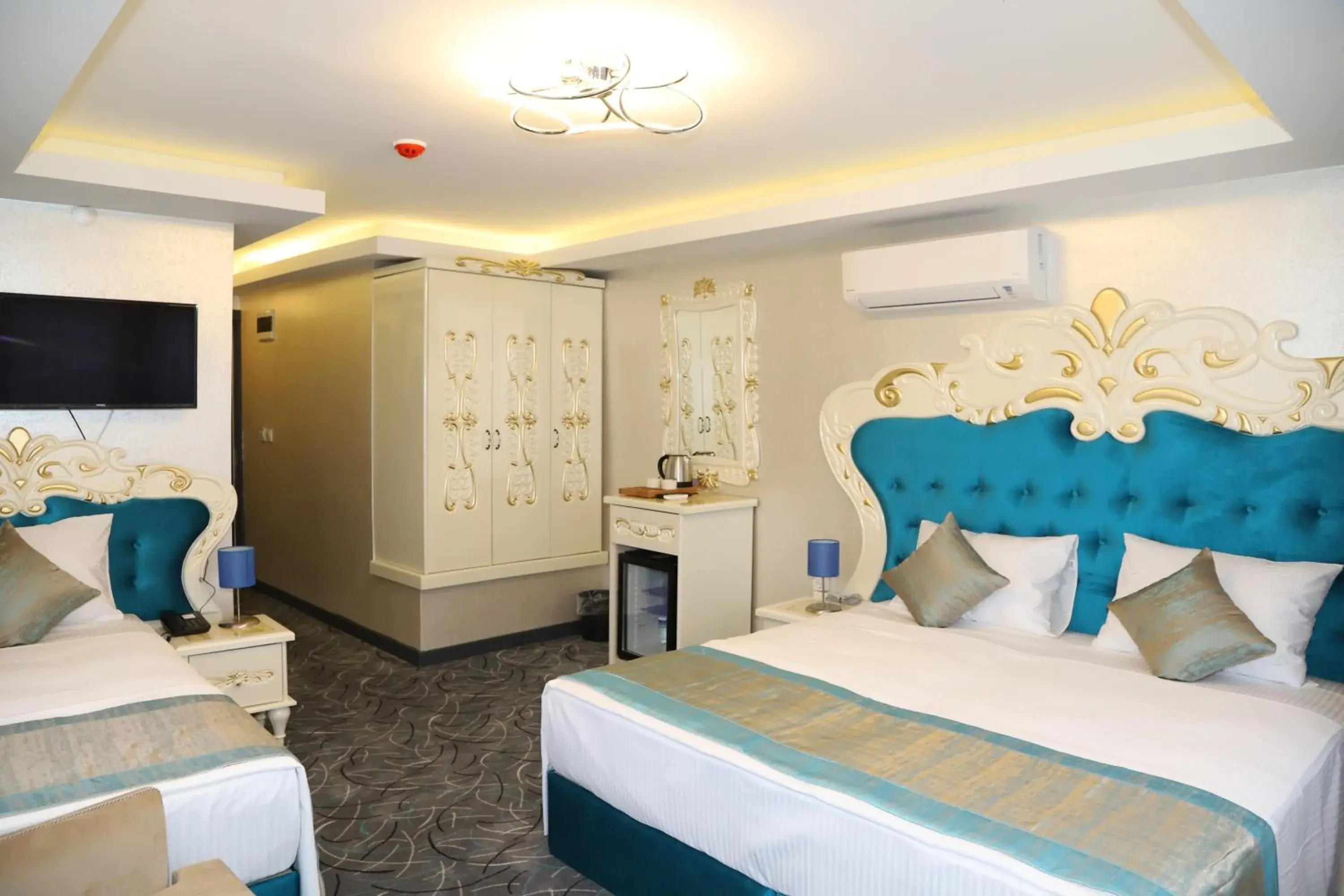 Bed in Grand Kavi Hotel