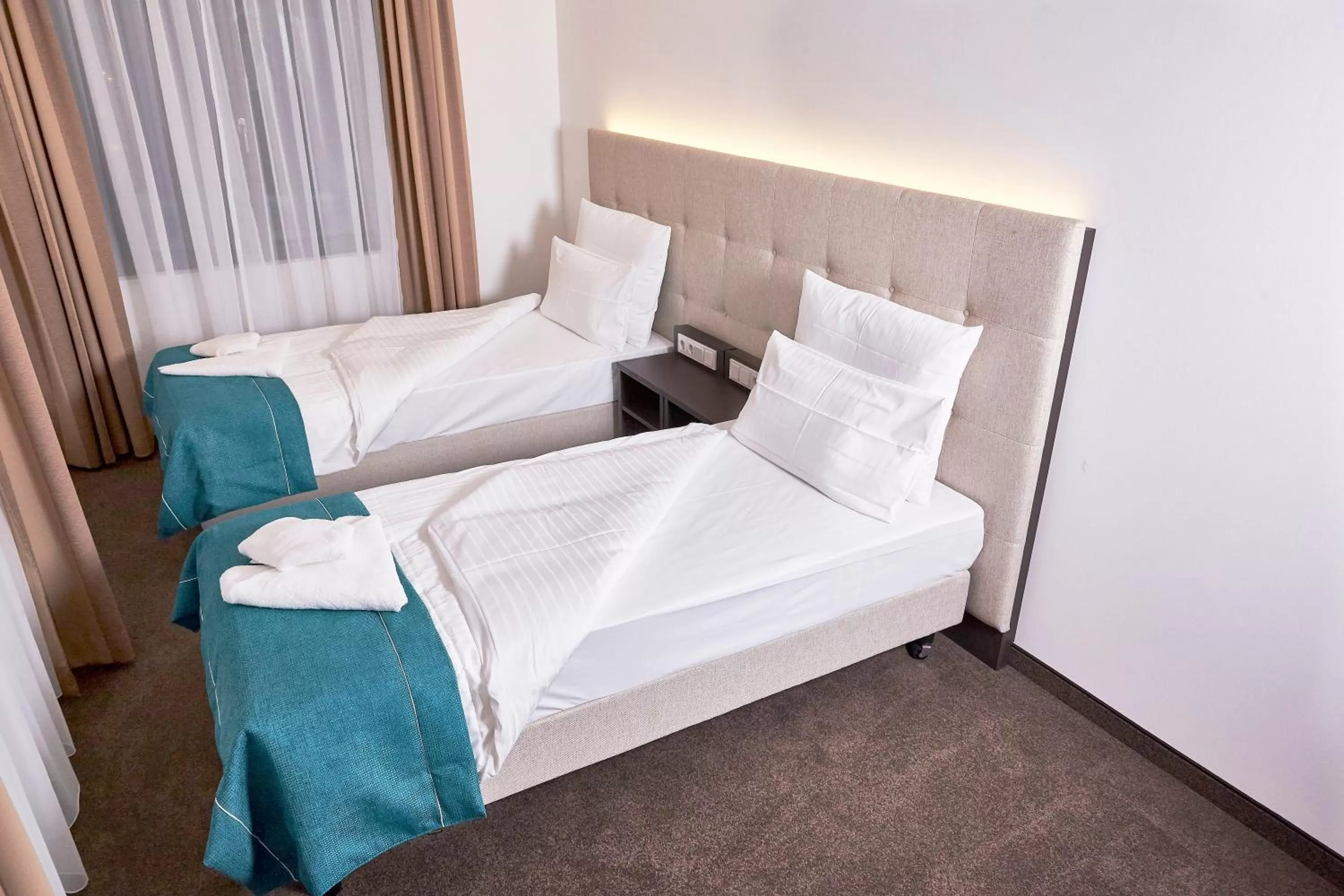 Bed in The Monument Hotel - BW Signature Collection