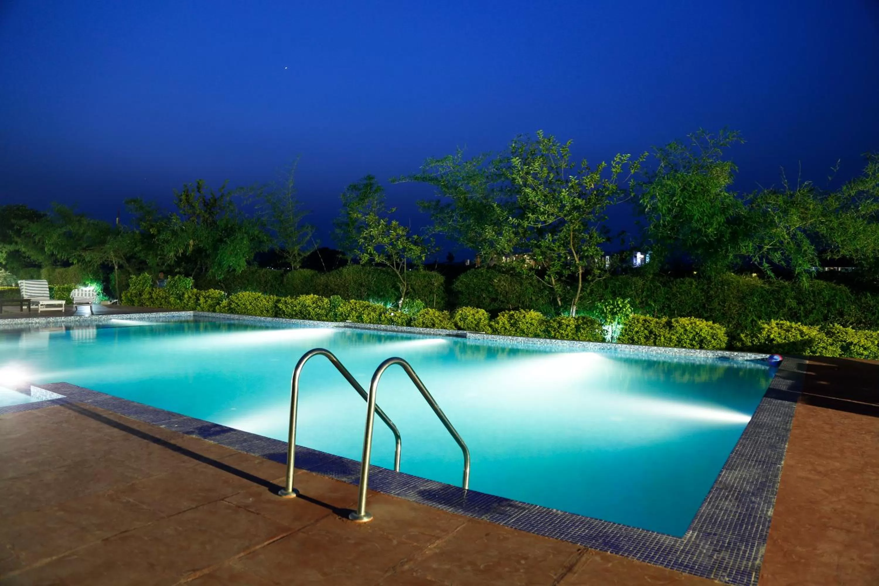 Swimming pool in Corbett Treat Resort By Atya Hotels