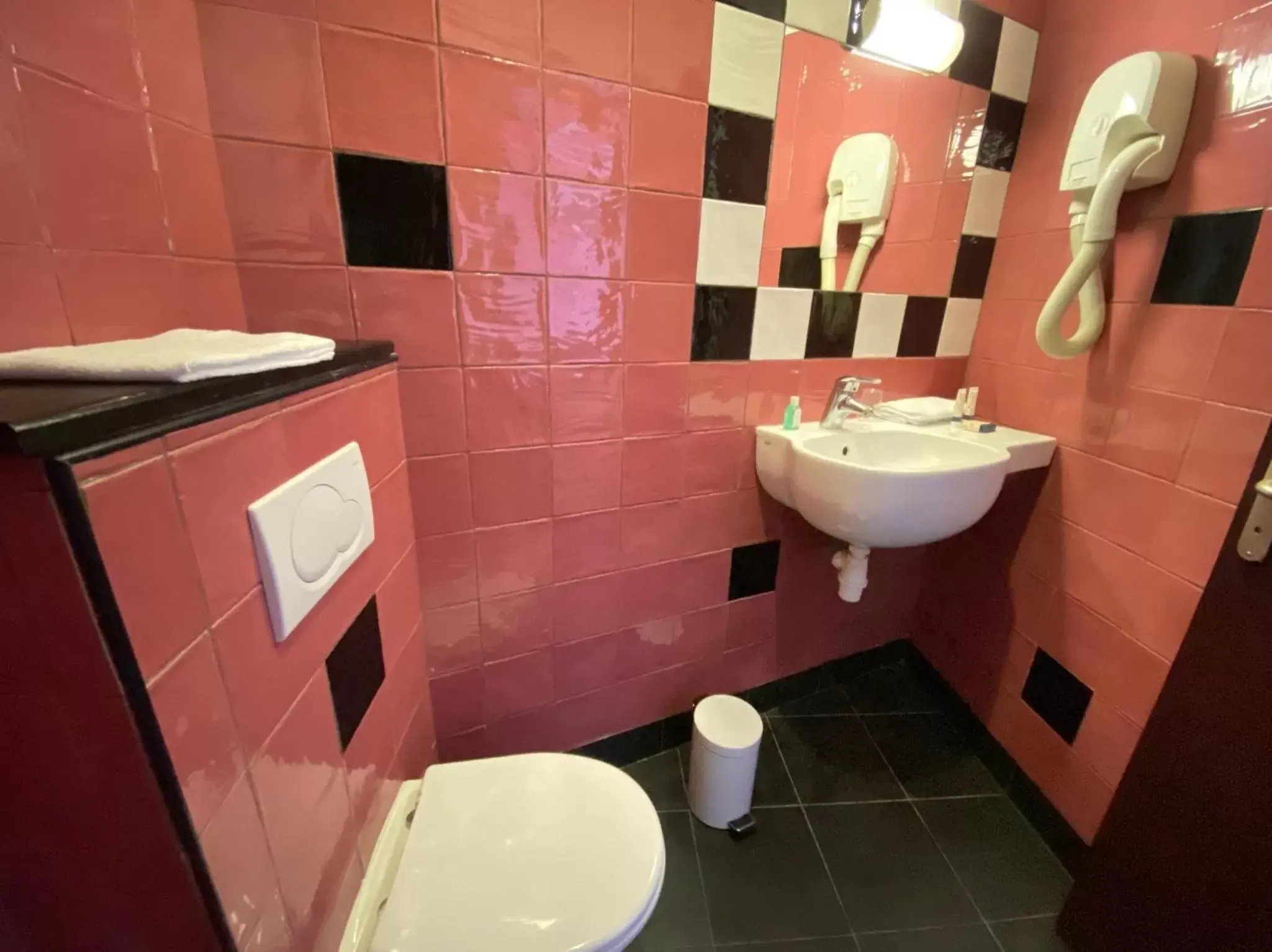 Bathroom in Walled off Hotel Paris