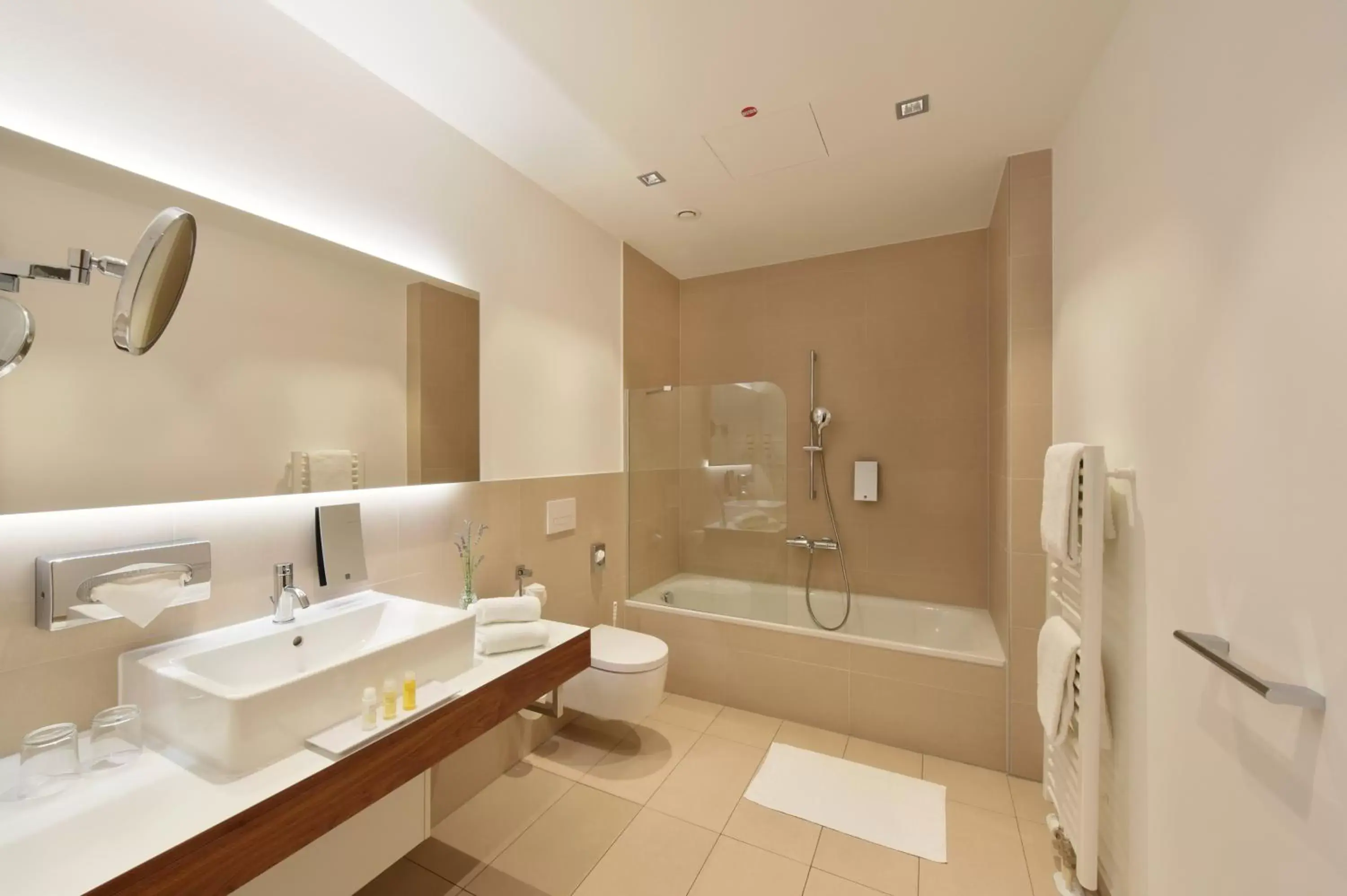 Bathroom in Amedia Plaza Dresden, Trademark Collection by Wyndham