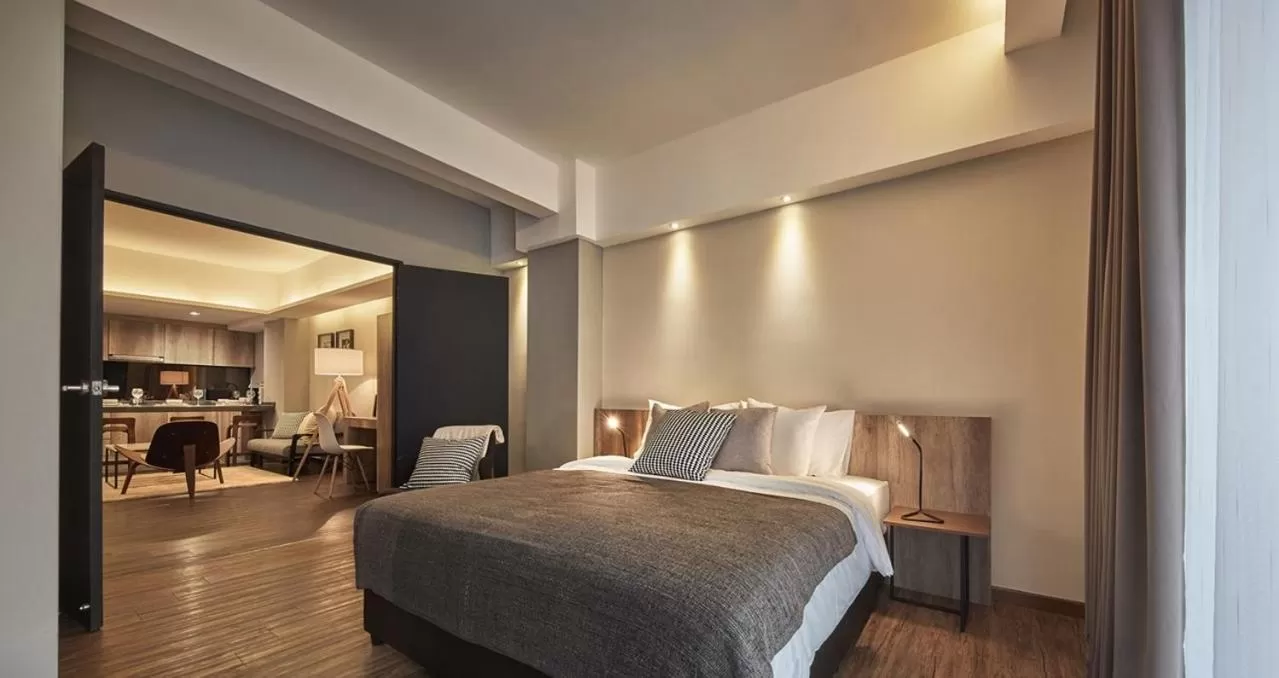 Bed in Tropics Eight Suites