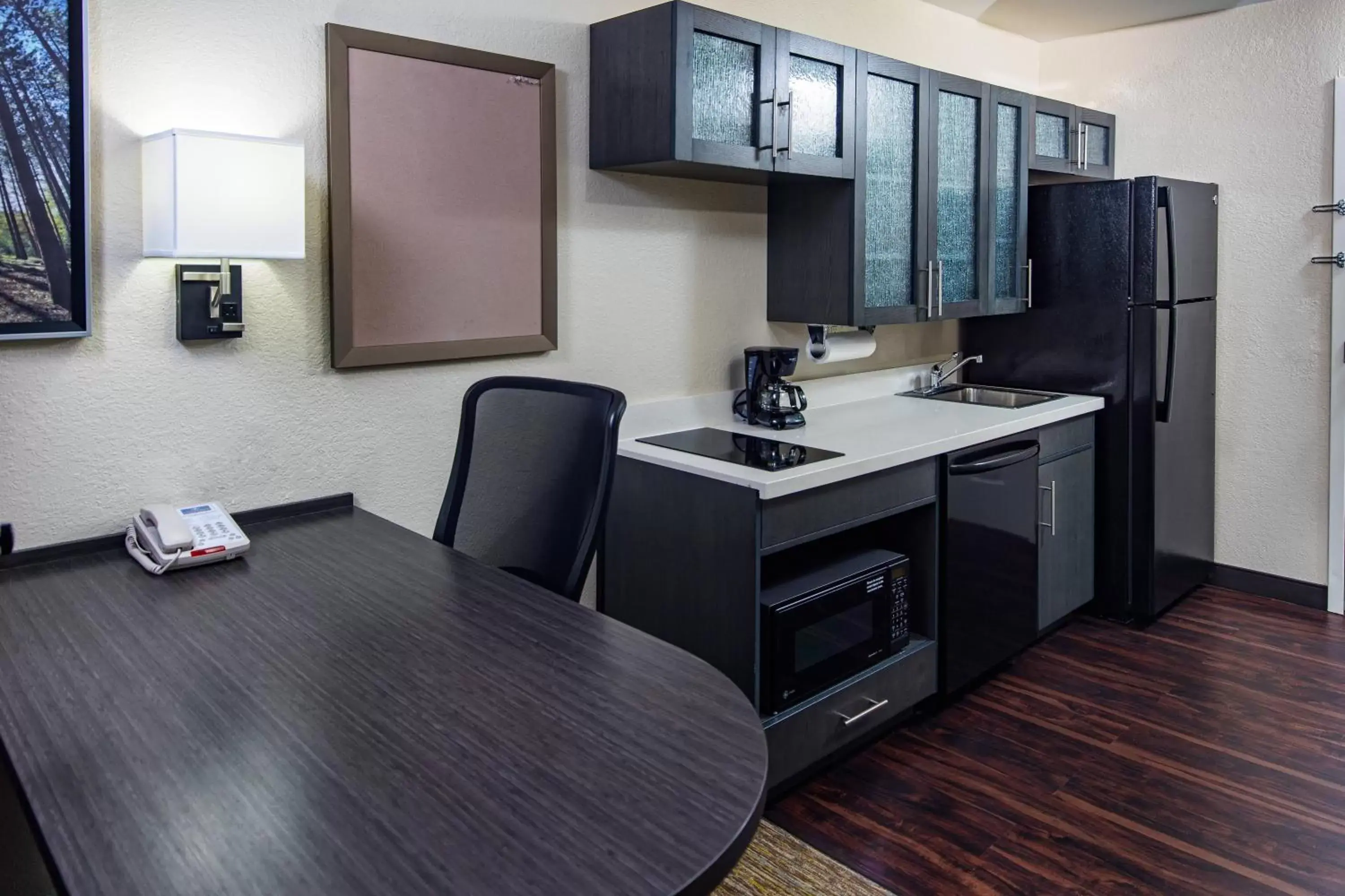 Photo of the whole room, Kitchen/Kitchenette in Candlewood Suites Appleton, an IHG Hotel
