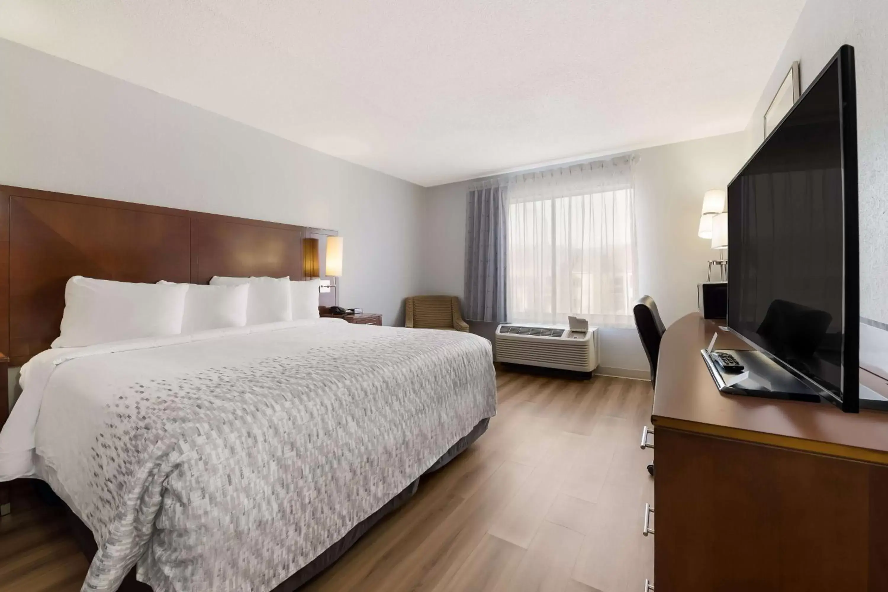 Bedroom in SureStay Hotel by Best Western Rockford East