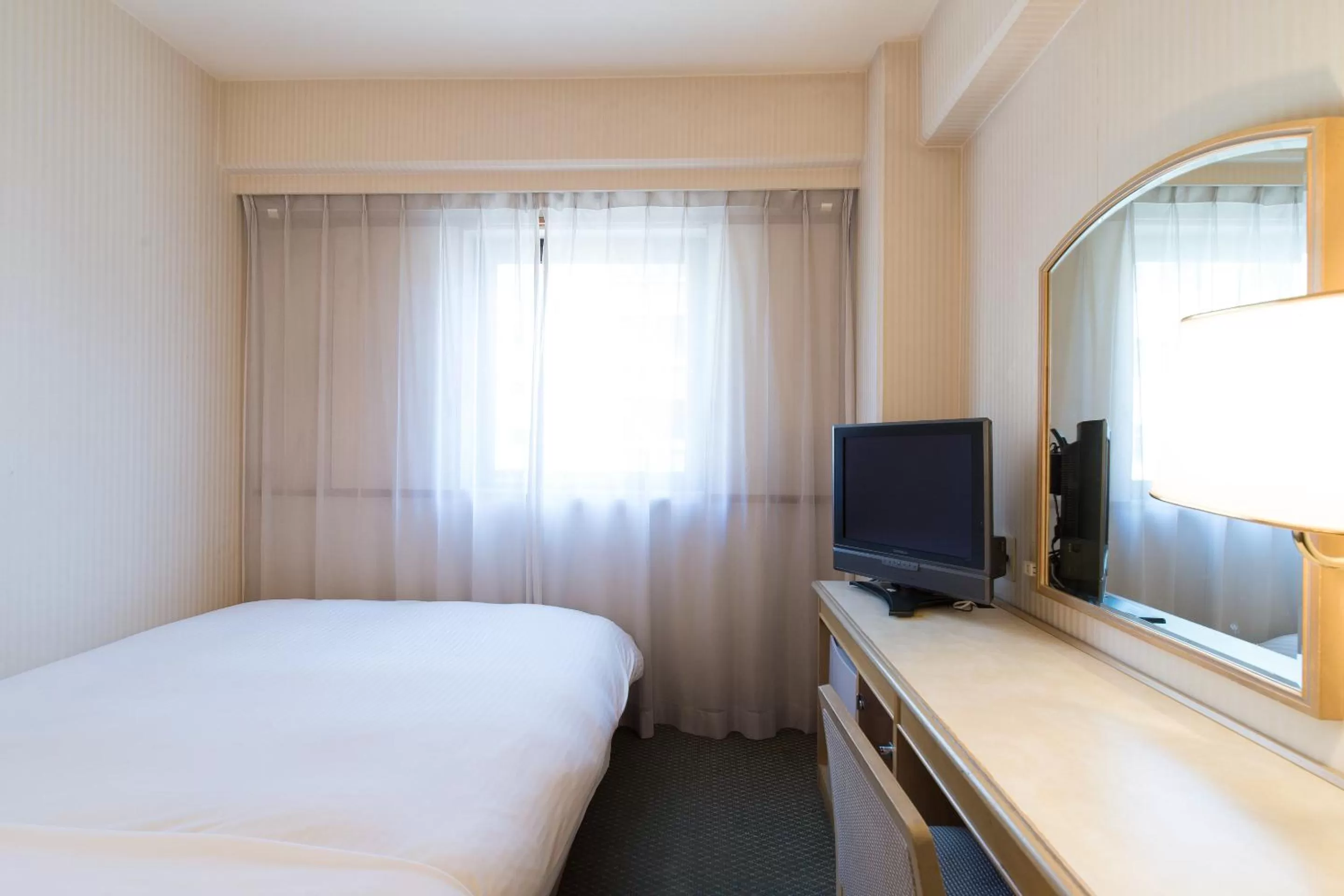 Photo of the whole room, Bed in Tabist Hotel Tetora Kitakyushu