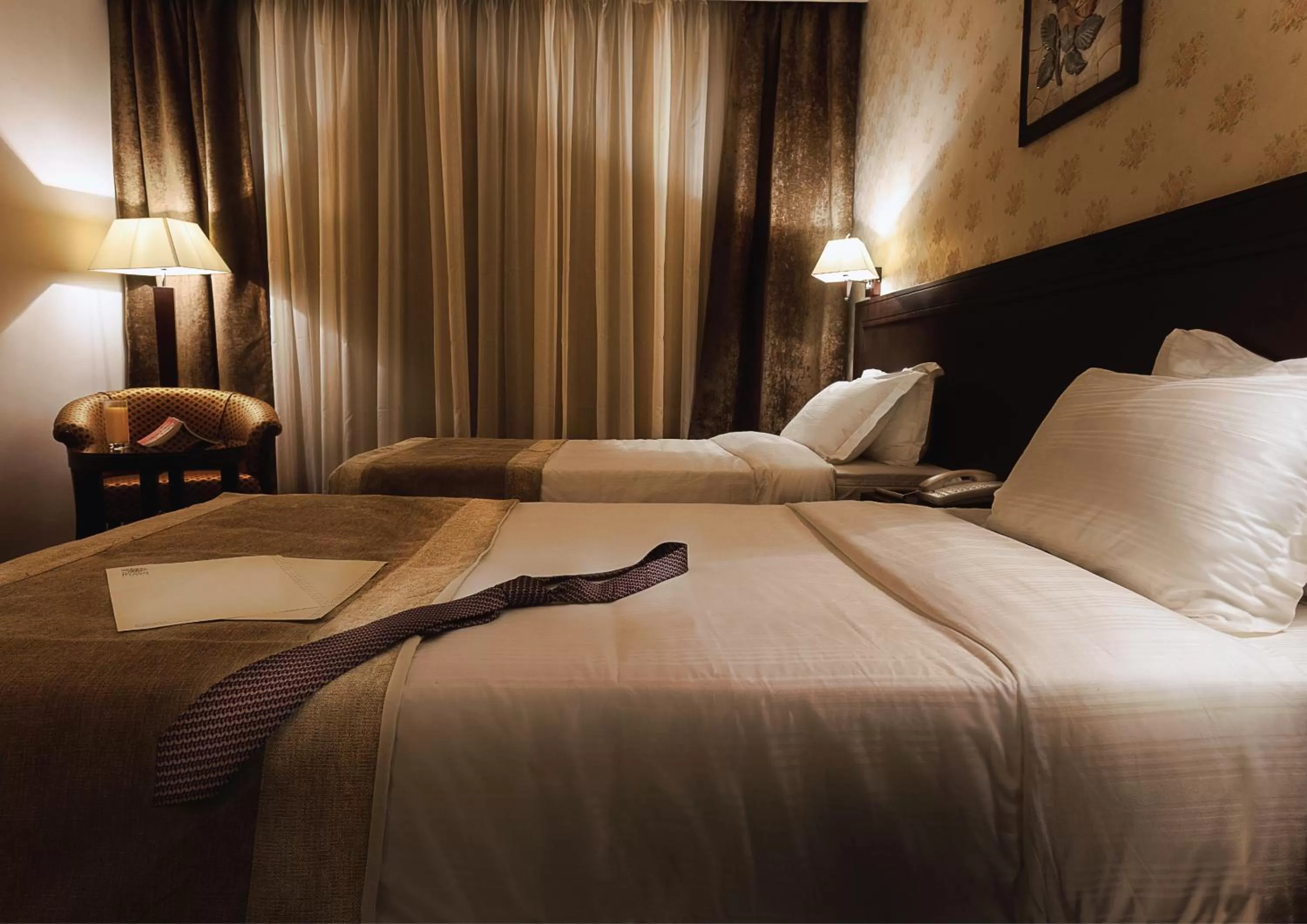 Bed in Seven Roses Hotel