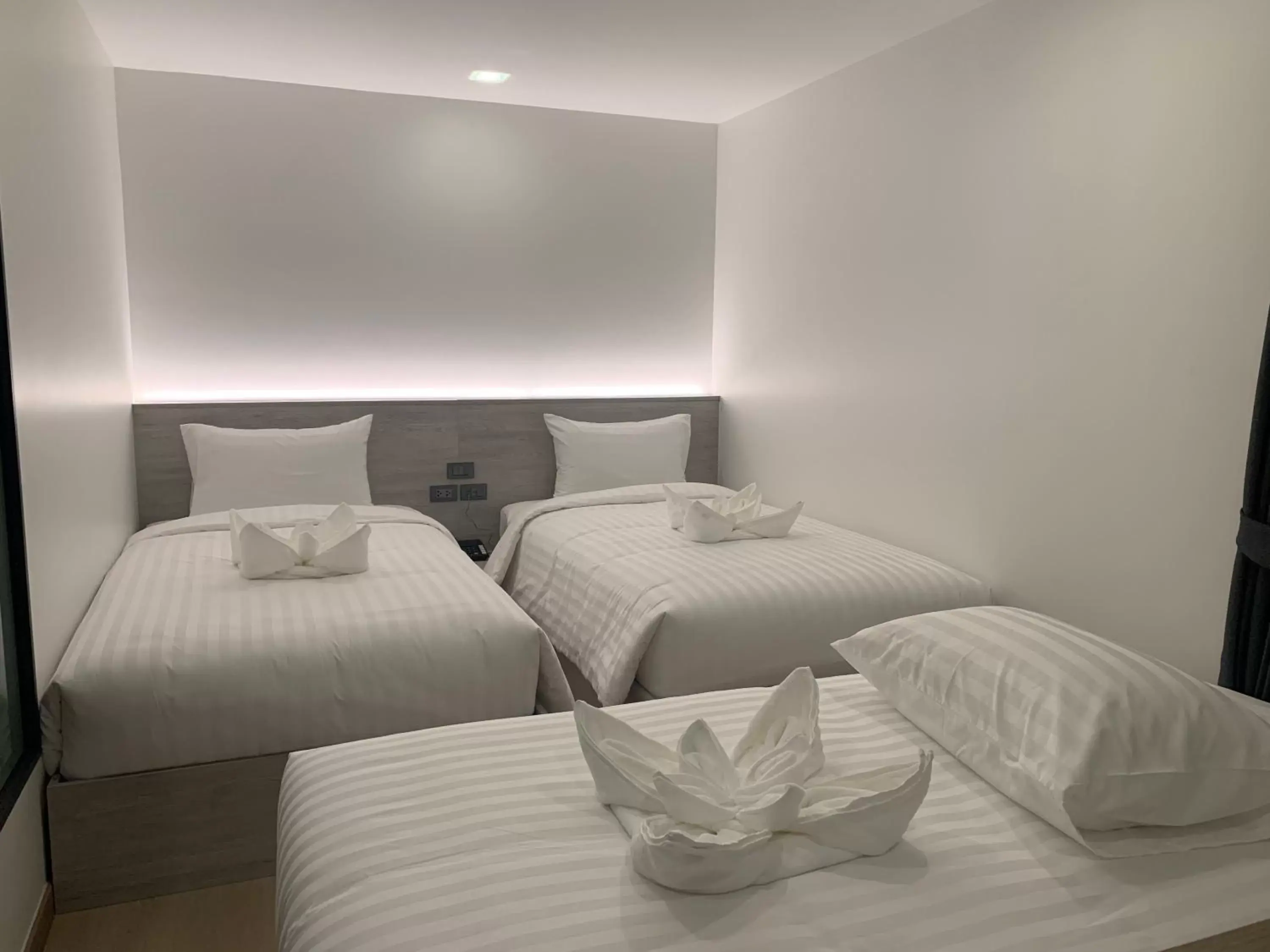 Bed in Thana Wisut Hotel - SHA Plus