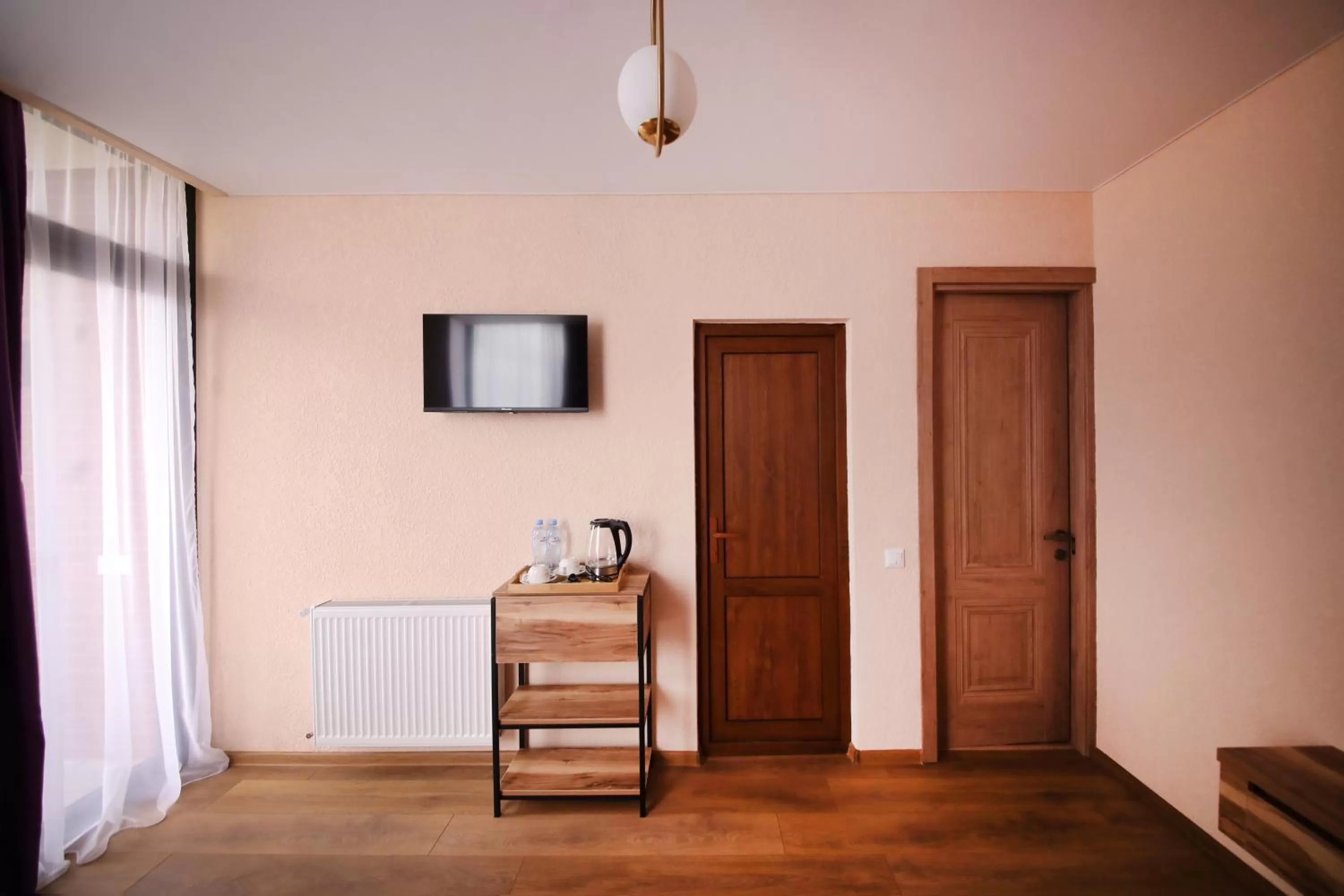 TV and multimedia, TV/Entertainment Center in Bessarion Boutique Hotel